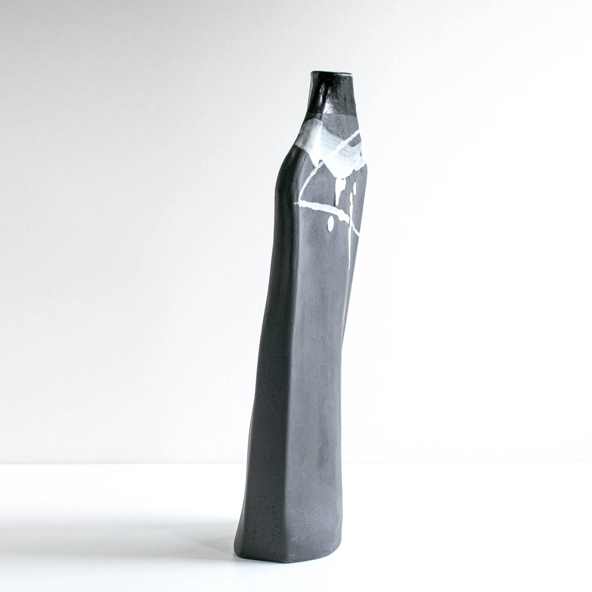 Bottle side 3 sq 144.jpg