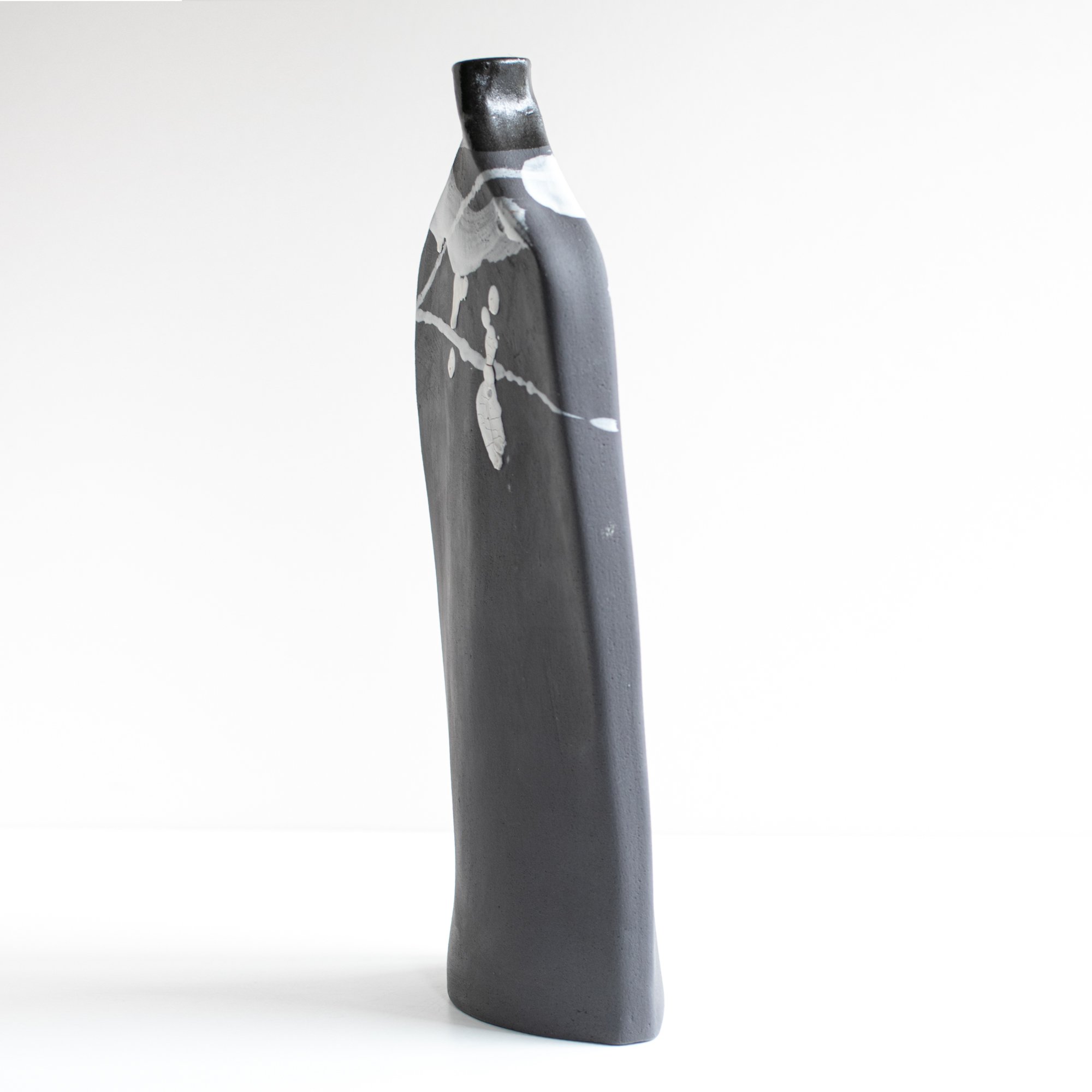 Bottle side 1 sq 144.jpg