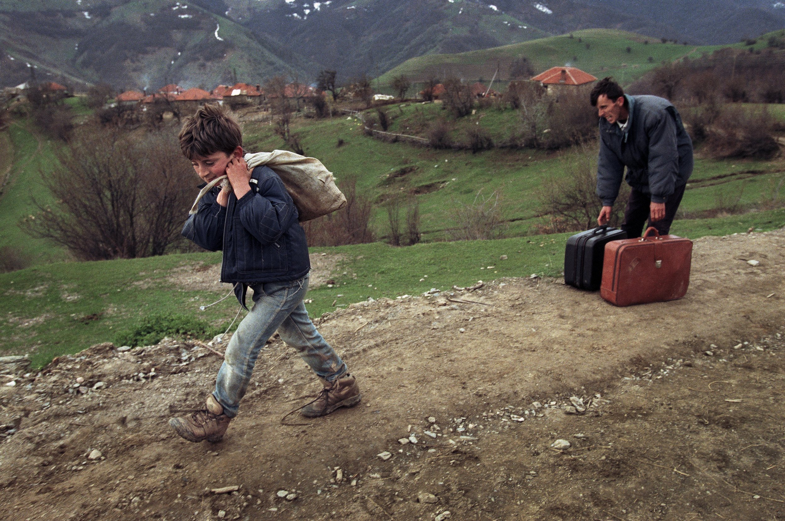kosovo refugee boy in mountians2.jpg