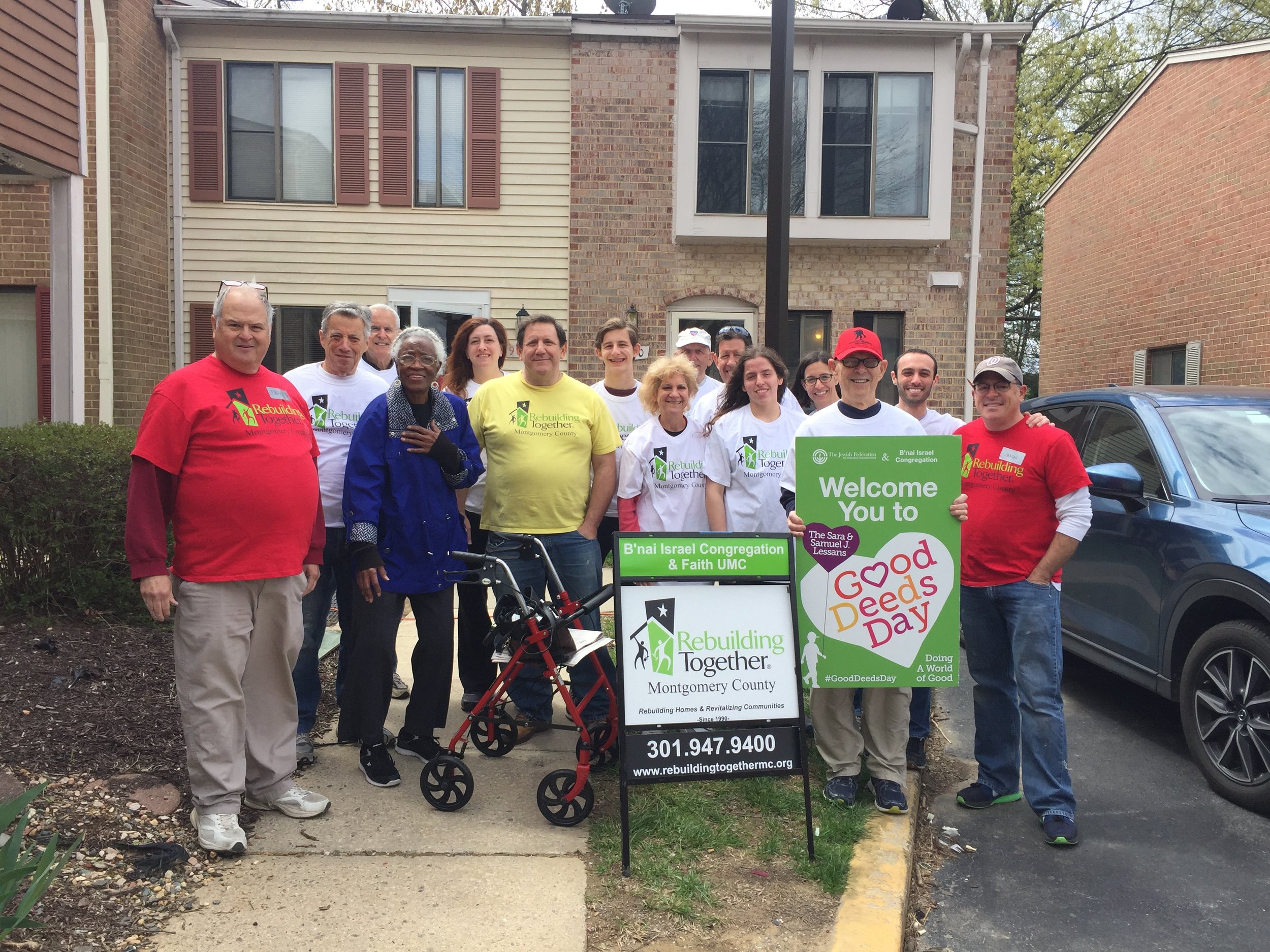 Jason Sheer (far right) volunteering with Rebuilding Together MC.