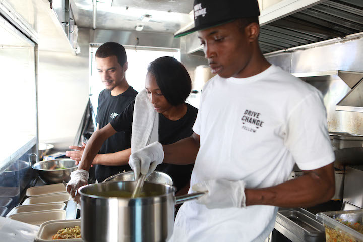 Fellows working on the Drive Change food truck.