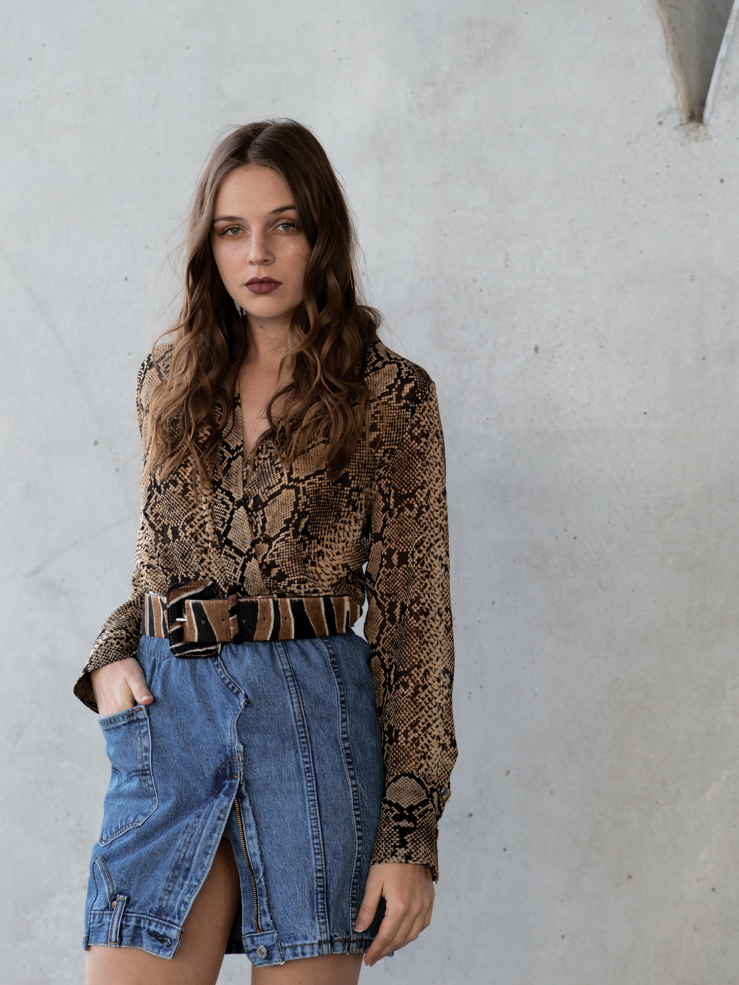 The Upcycled Denim Skirt by Andrea Kader is a repurposed denim skirt made from multiple denim jeans. The drawstring waist, upside down zipper, and side pocket elevates this skirt from typical to an Andrea Kader Exclusive.