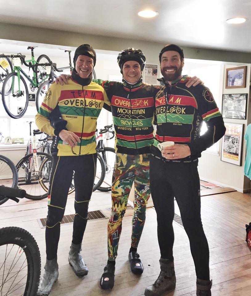  Joseph Conrad-Ferm wearing one of his Kapow meggings collaborative designs. Pictured with Overlook Mountain bike team members Kevin Smith and OMB owner William (Billy) Denter. Woodstock, NY. 