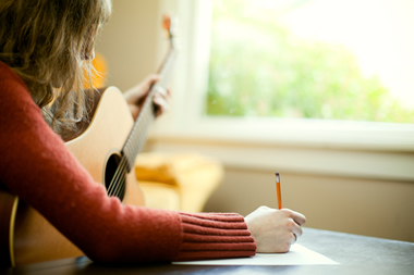 songwriter_with_guitar.jpeg
