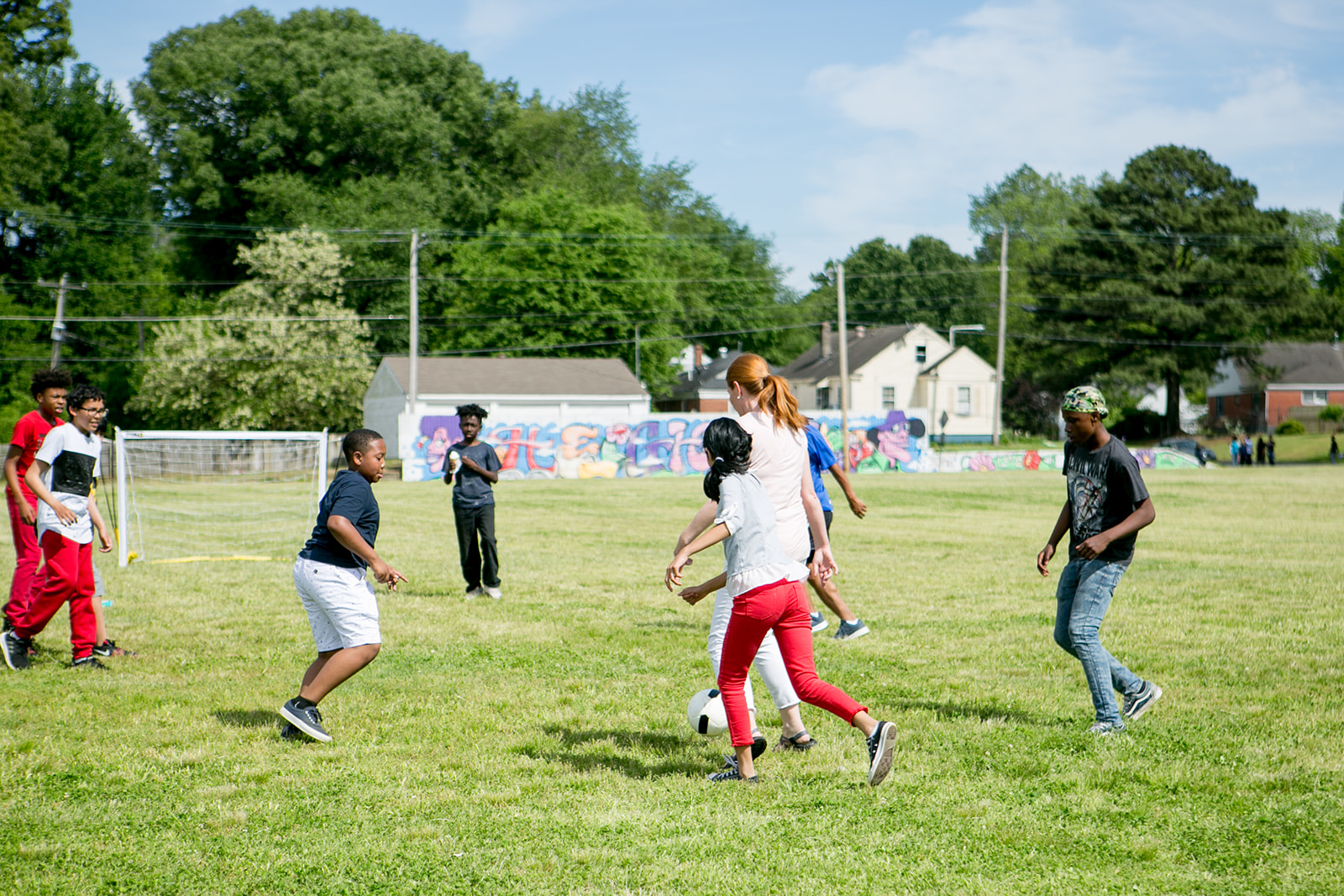 photo of kids playing soccer