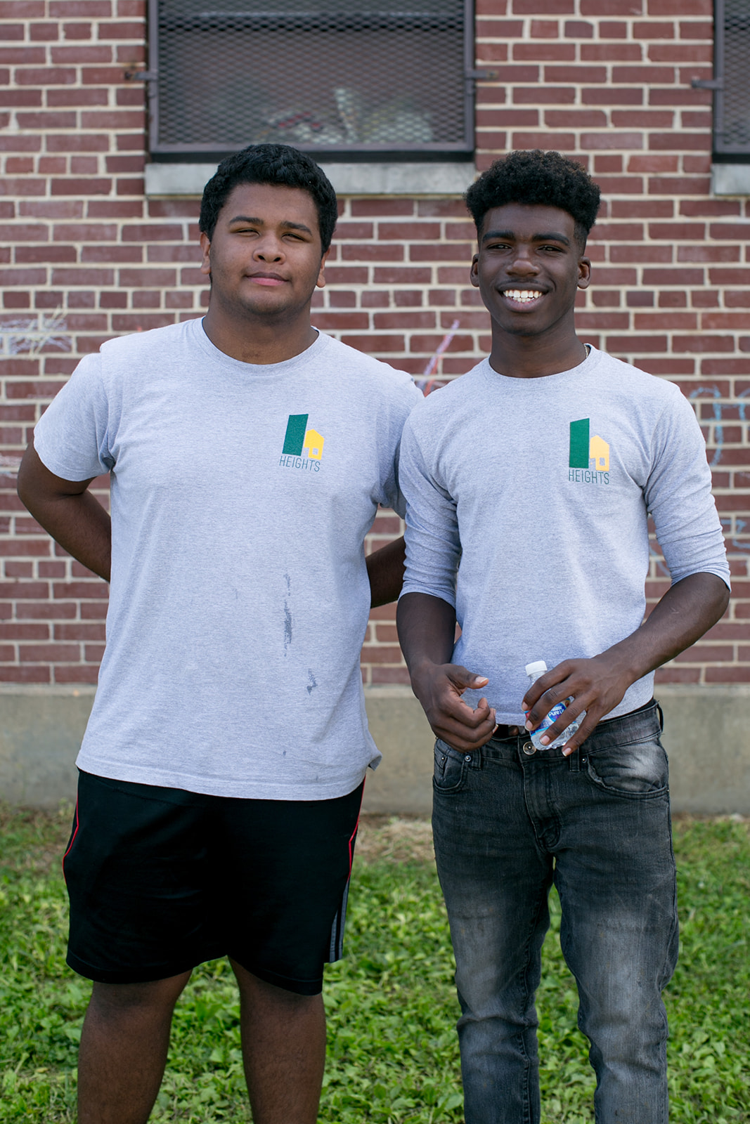 two teen boys smiling