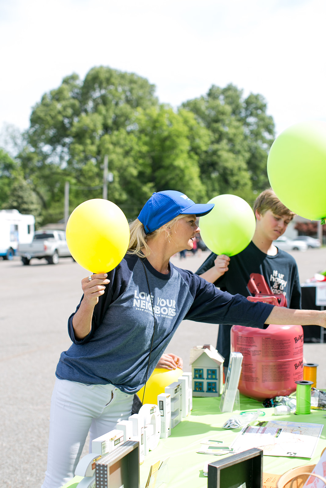 photo of woman holding balloon