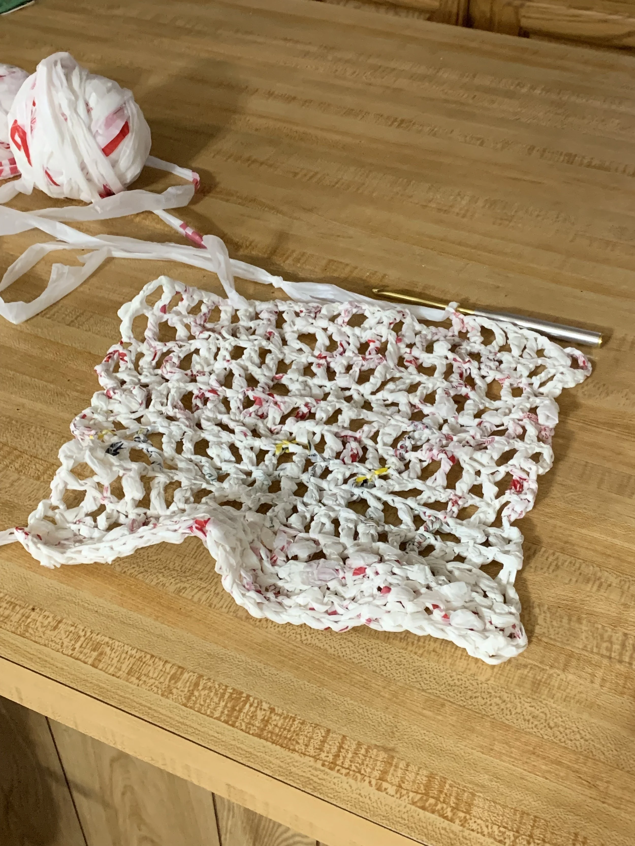 The beginnings of my first tote bag made of plarn.