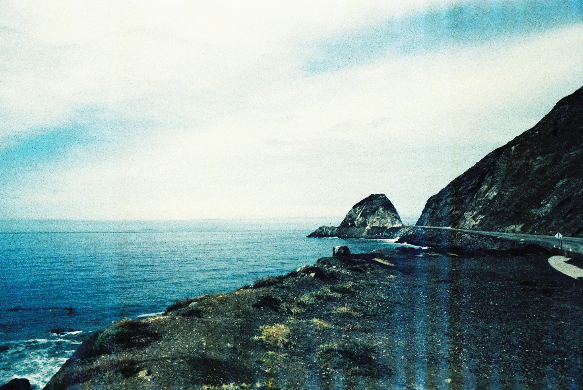 Pentax K1000. Cross processed 35mm color film. Distortion from accidental exposure to airport luggage x-ray. Malibu, California. 2015.