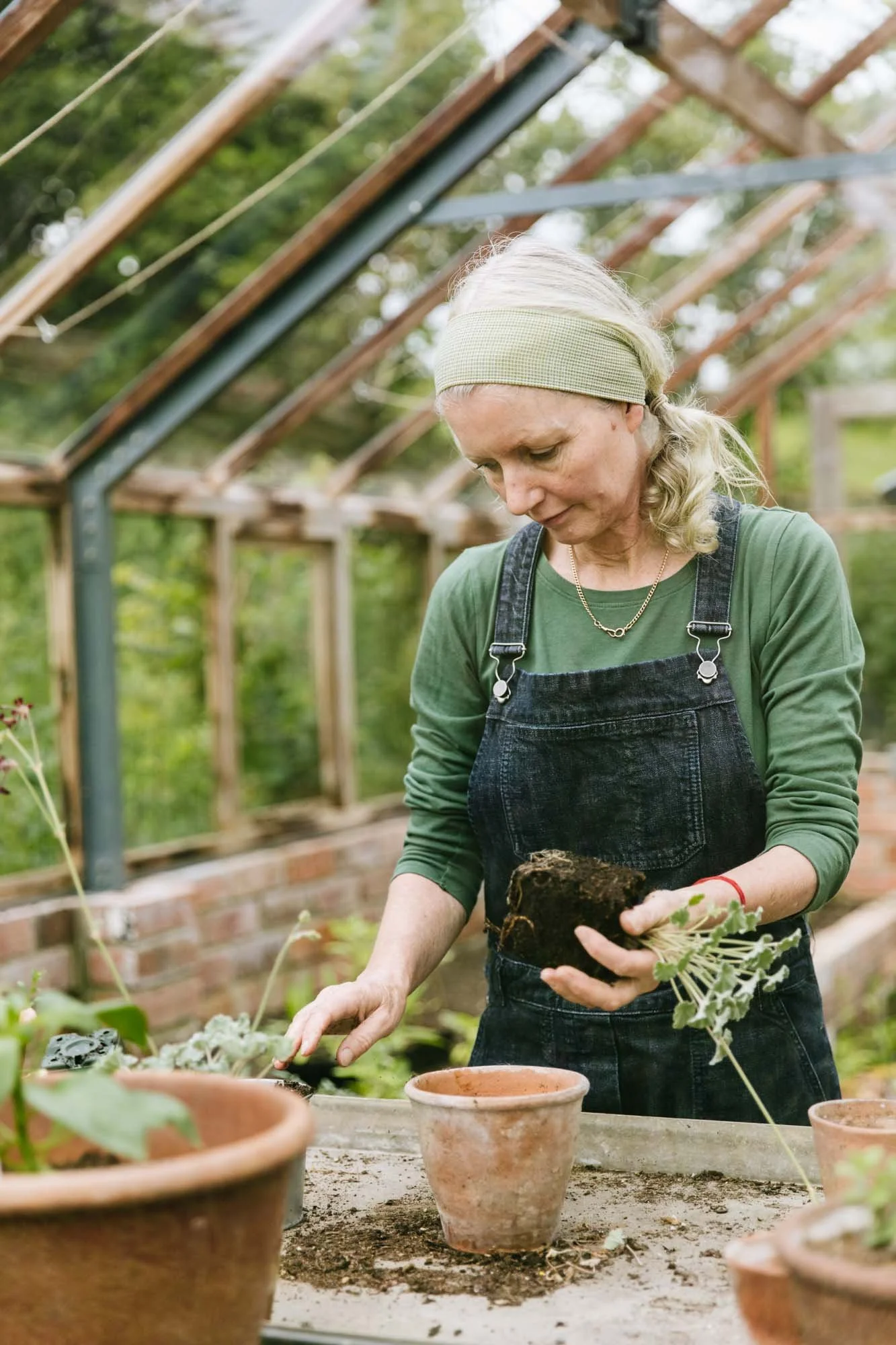 Alison Jenkins in her greenhouse at Damson Farm