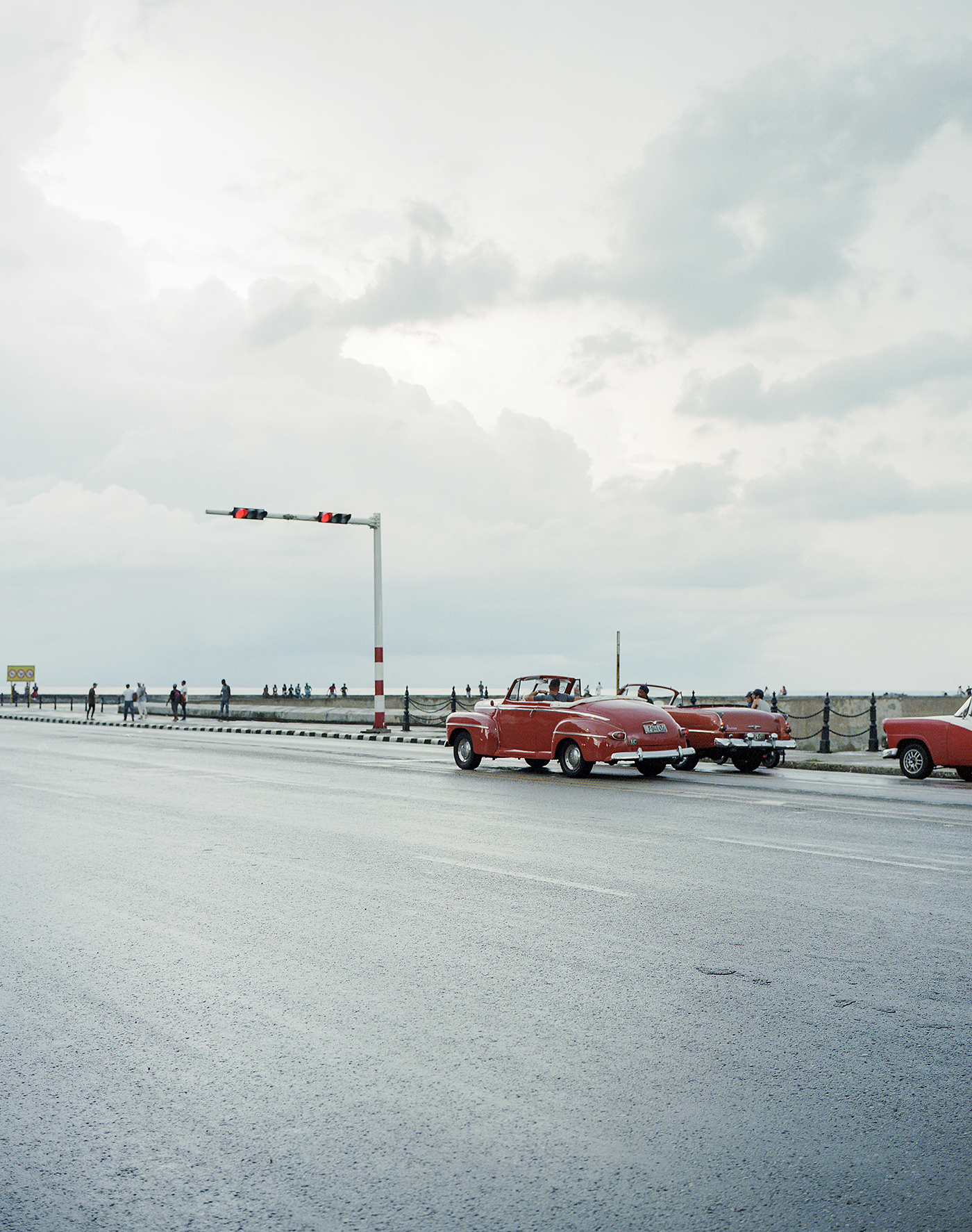 cars waiting at the traffic lights. Malécon, La Habana, Cuba 2018
