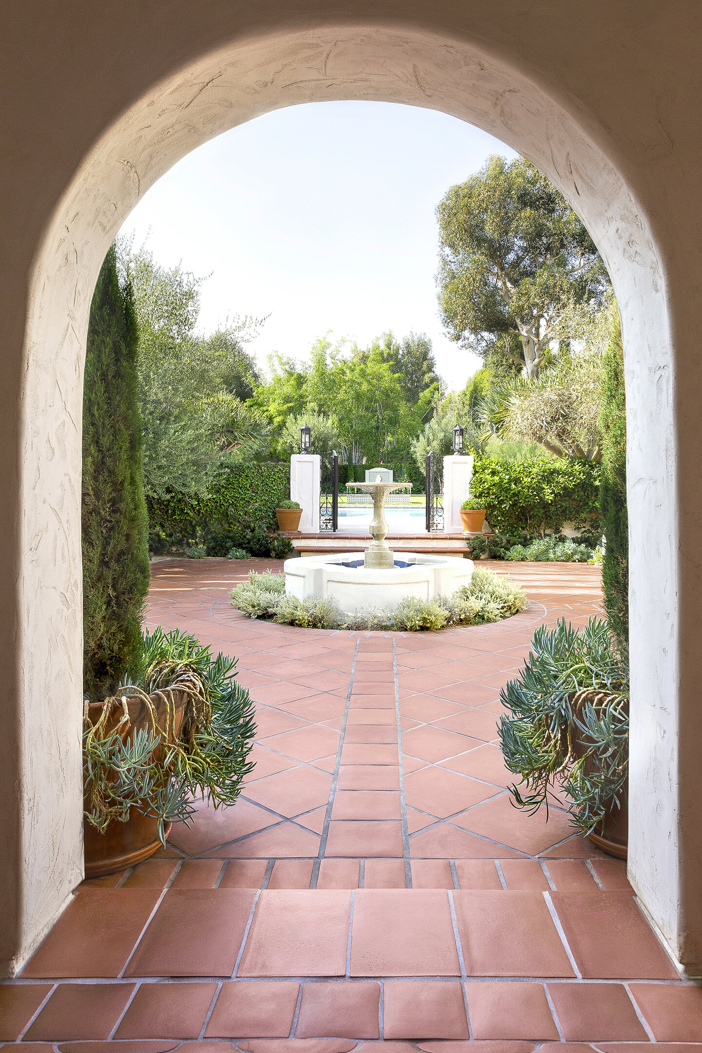 spanish-home-courtyard-fountain-saltillo-tile-chelseadc.jpg