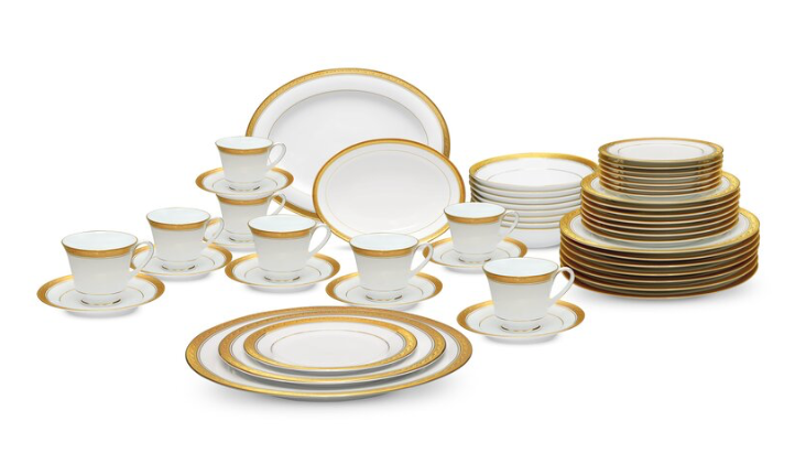 Similar white dishes with gold trim