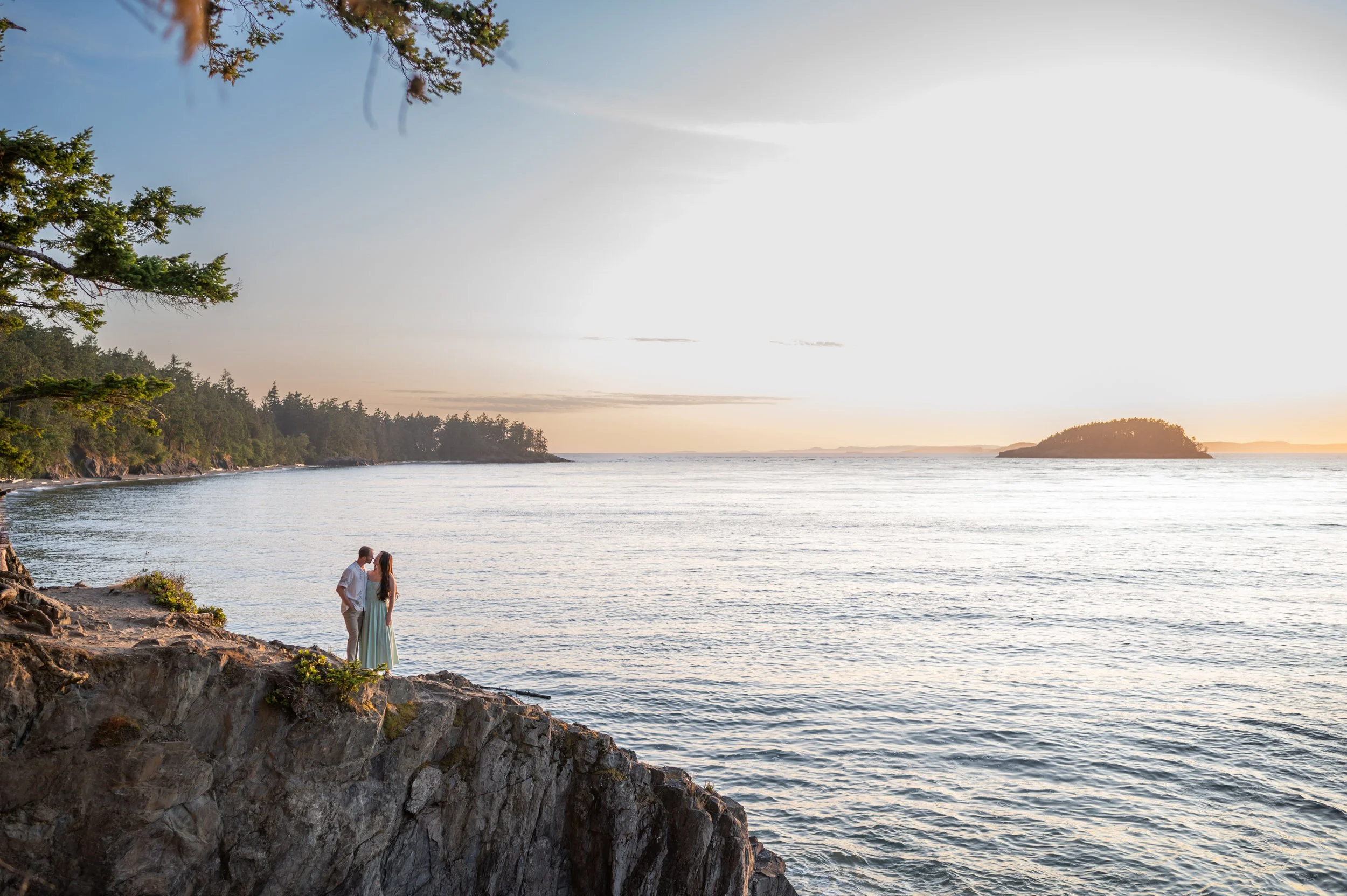 family session at deception pass beach at sunset on a cliff