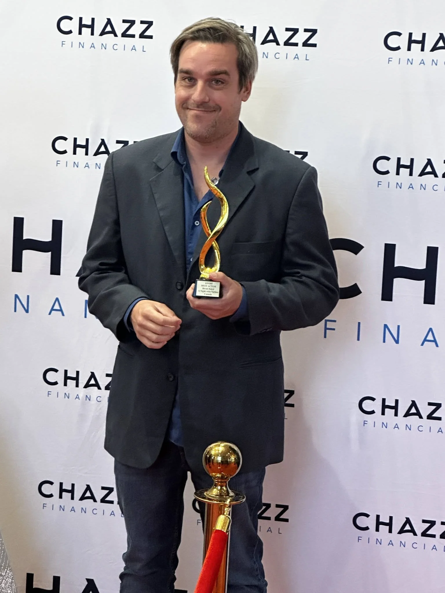 Director Brent Baird accepts his award for "Best" Actor" at the Kitchener-Waterloo International Film Festival