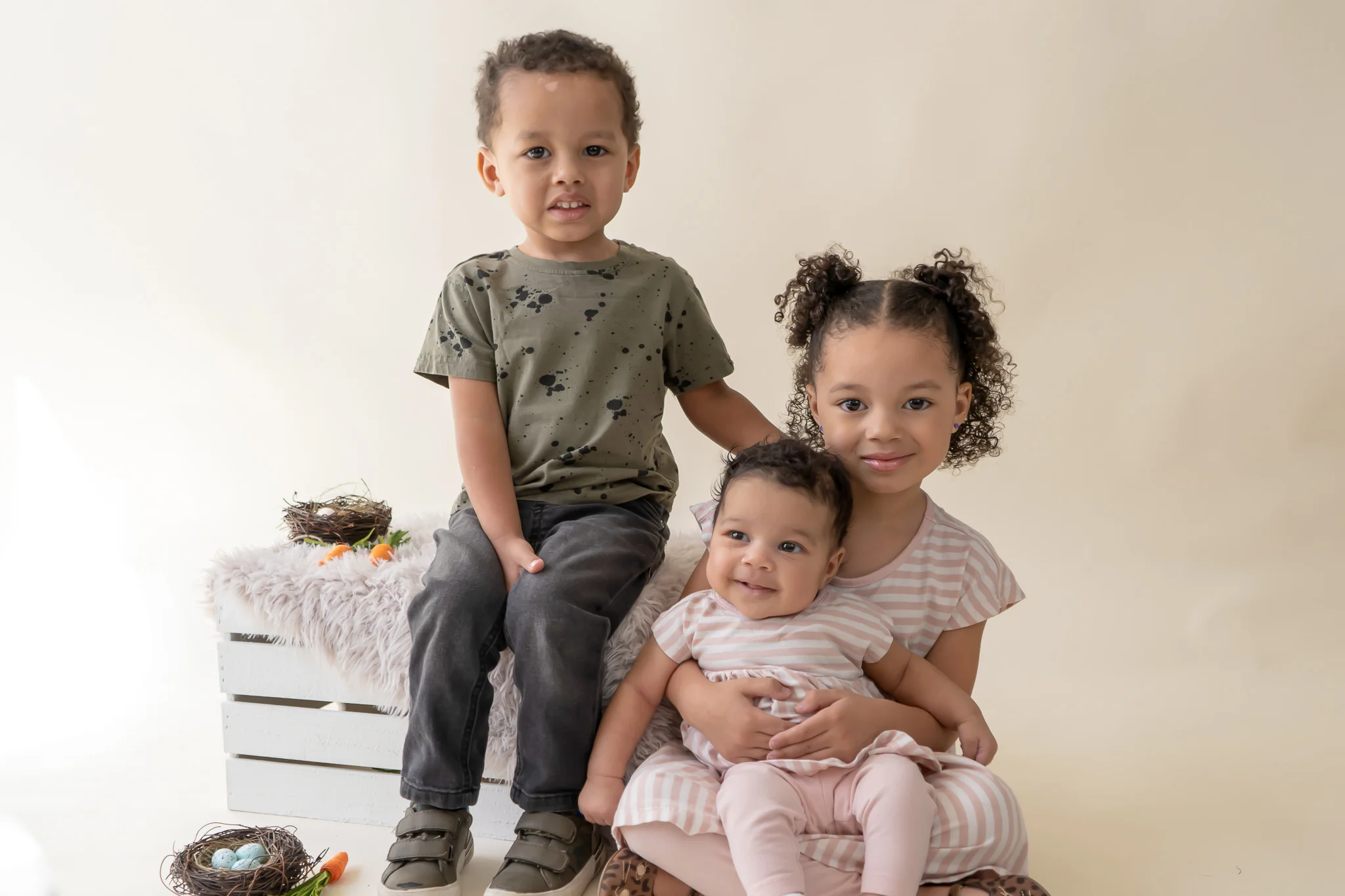 Siblings pose for an indoor mini sesion in New Jersey.jpg