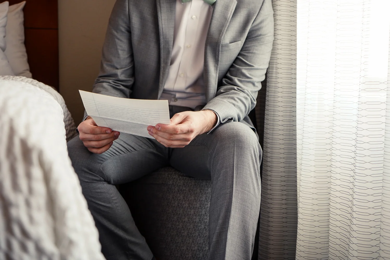 Groom reads letter from his bride in Maryland wedding
