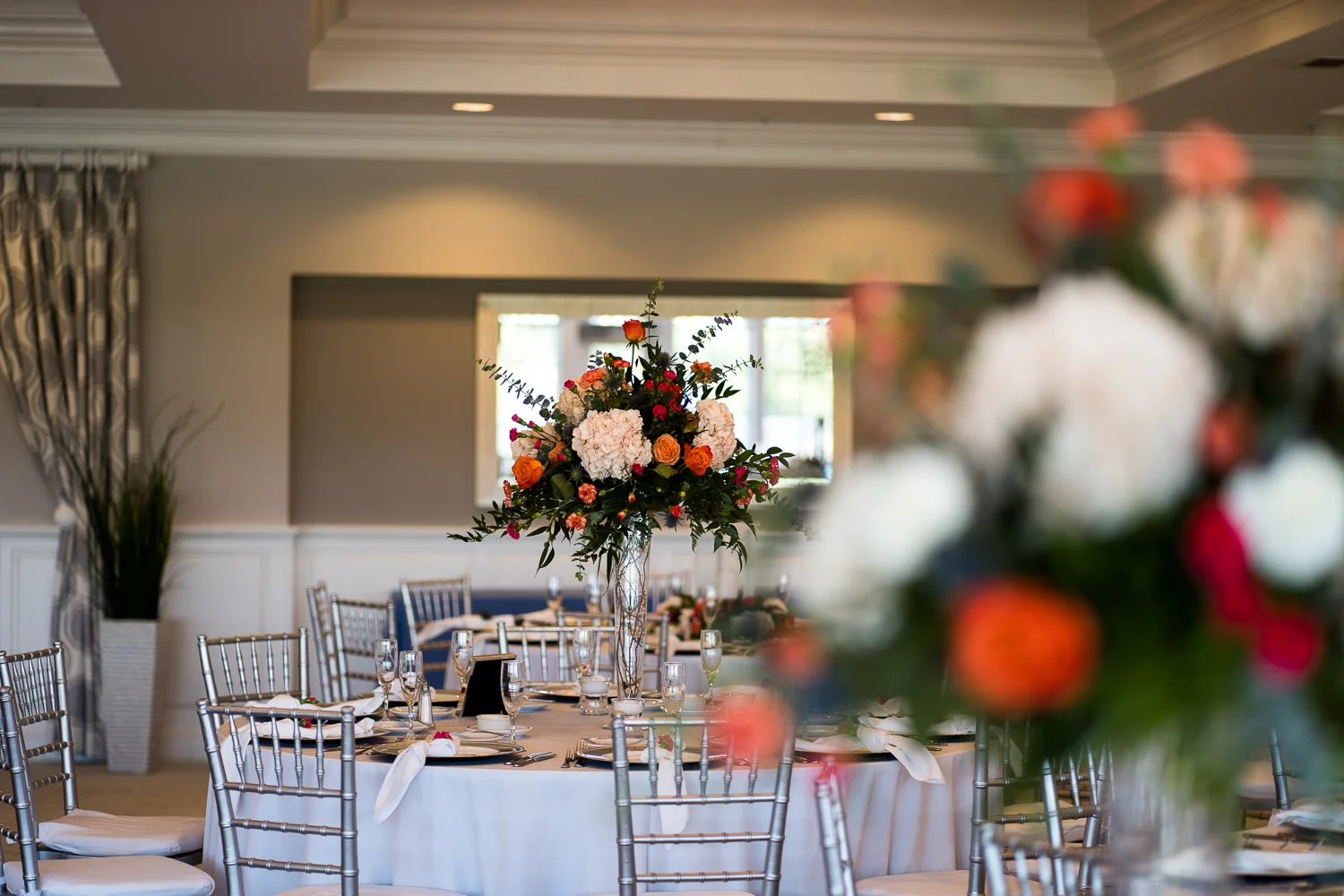 Tables set for Baywood Greens wedding