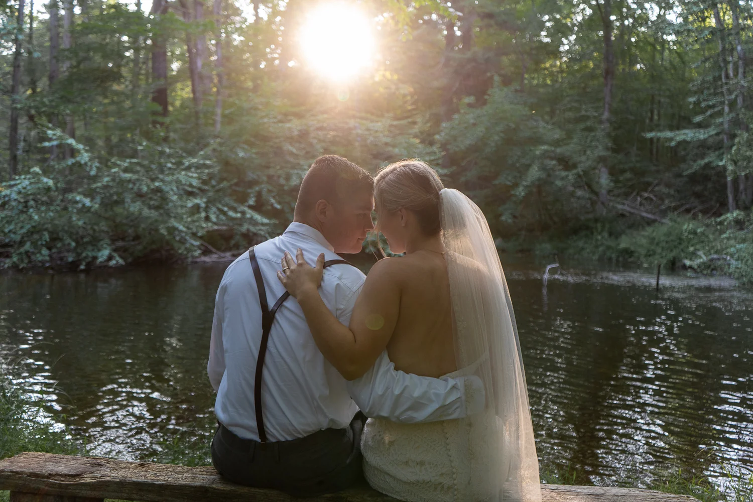 Sun flares in on new husband and wife during Poconos elopement