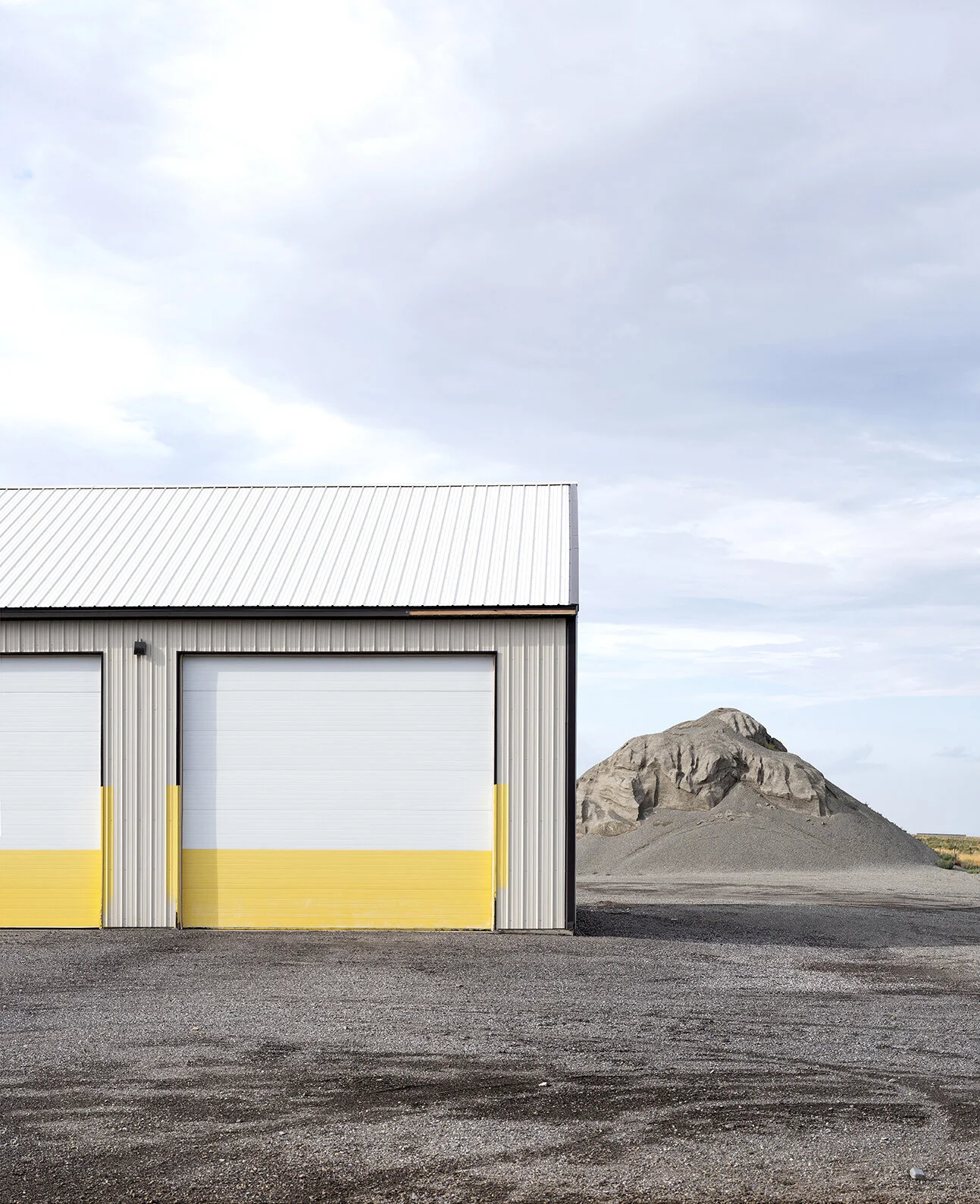 Garage, Pile, Malta, Idaho, 2019 / 22.5”x 27” / Archival Giclée Painted wood frame, museum glass