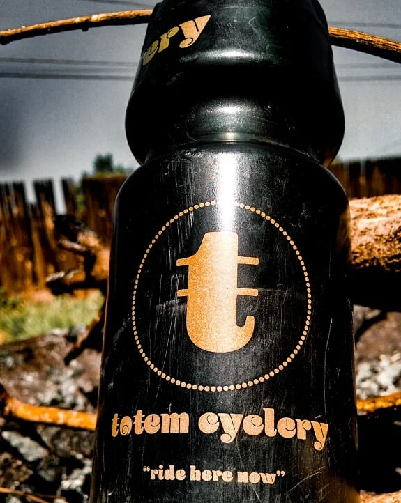 totem cyclery denver bike shop custom bottle