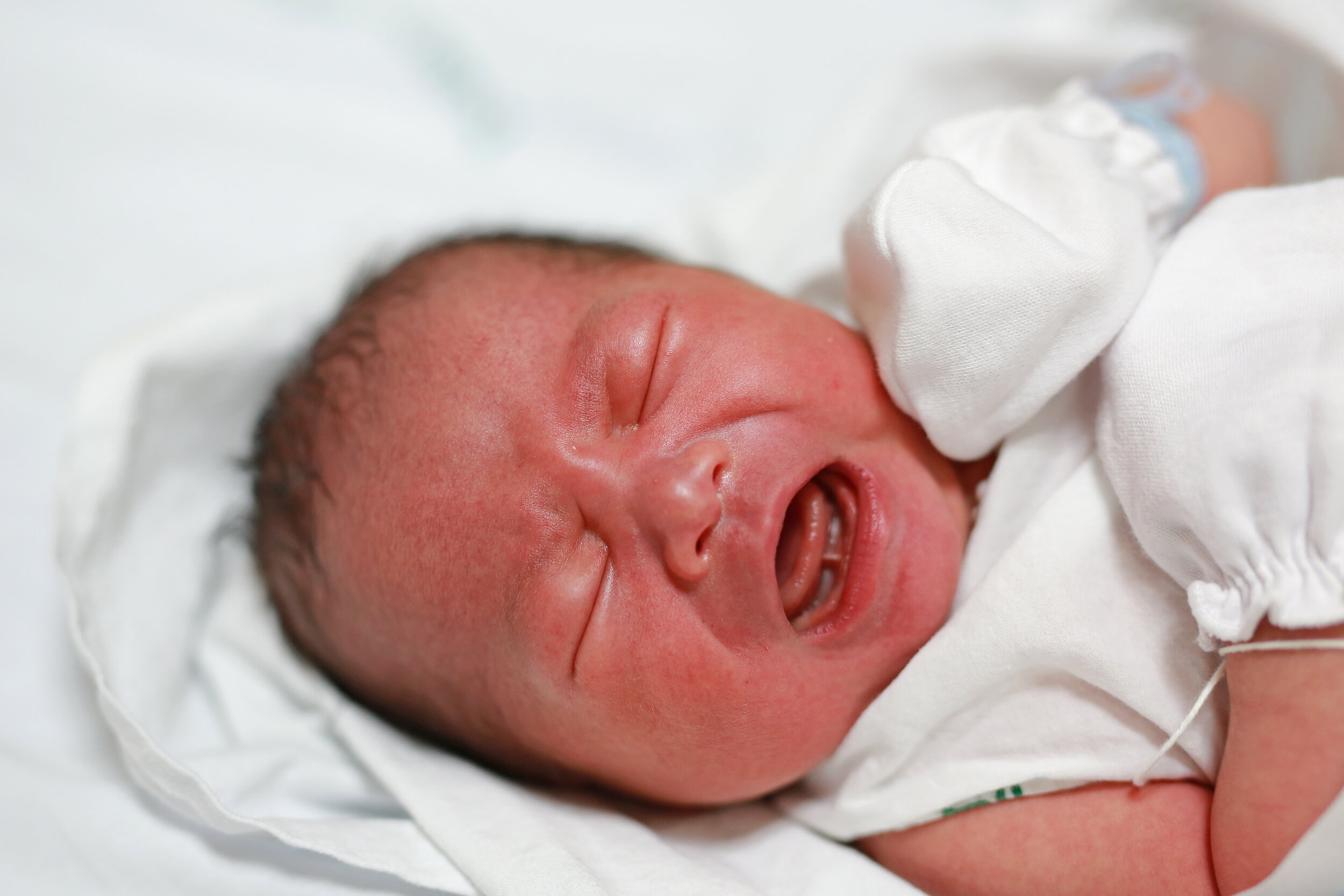 2 month old baby making clicking sound