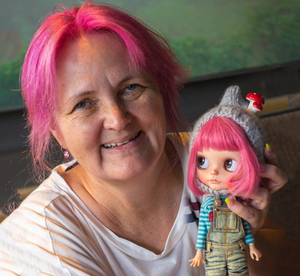 Miroslava with one of her dolls