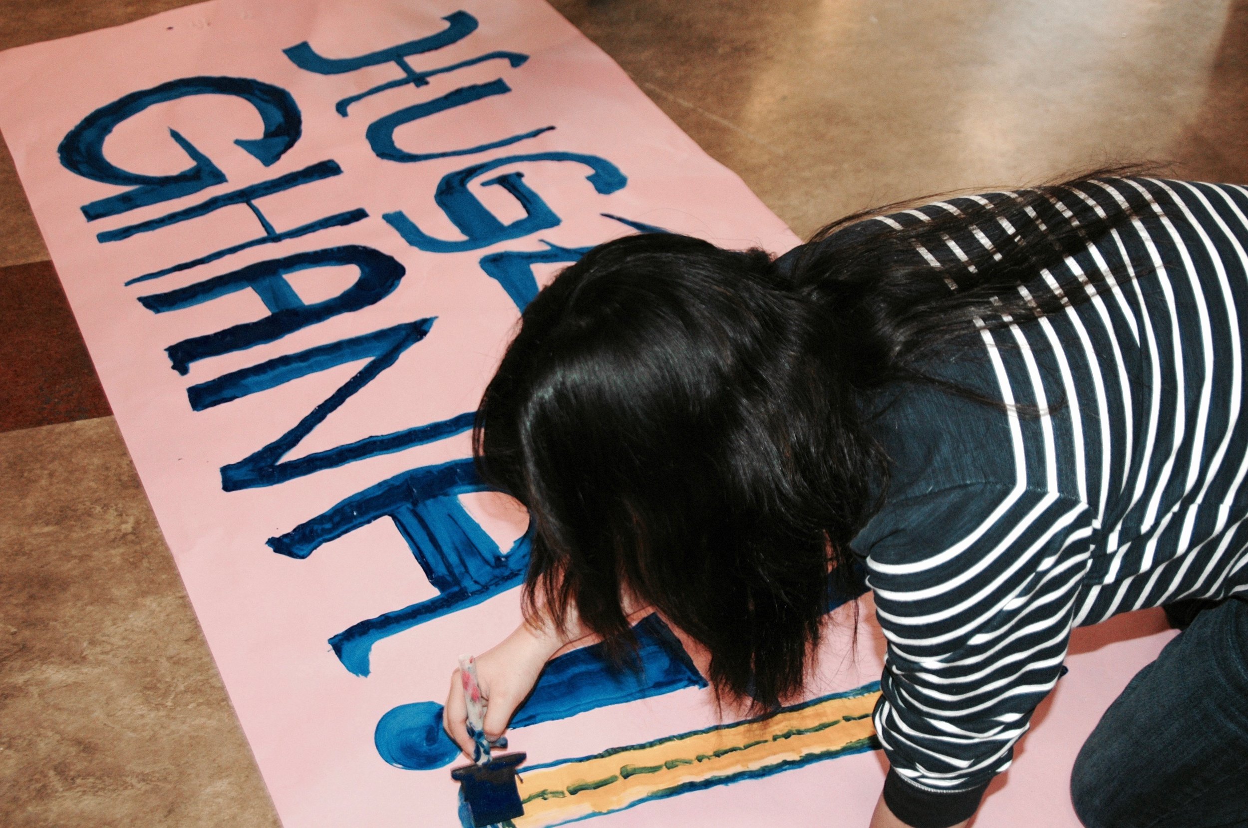  Students at Kamiak High School creating posters for an upcoming school supply drive 