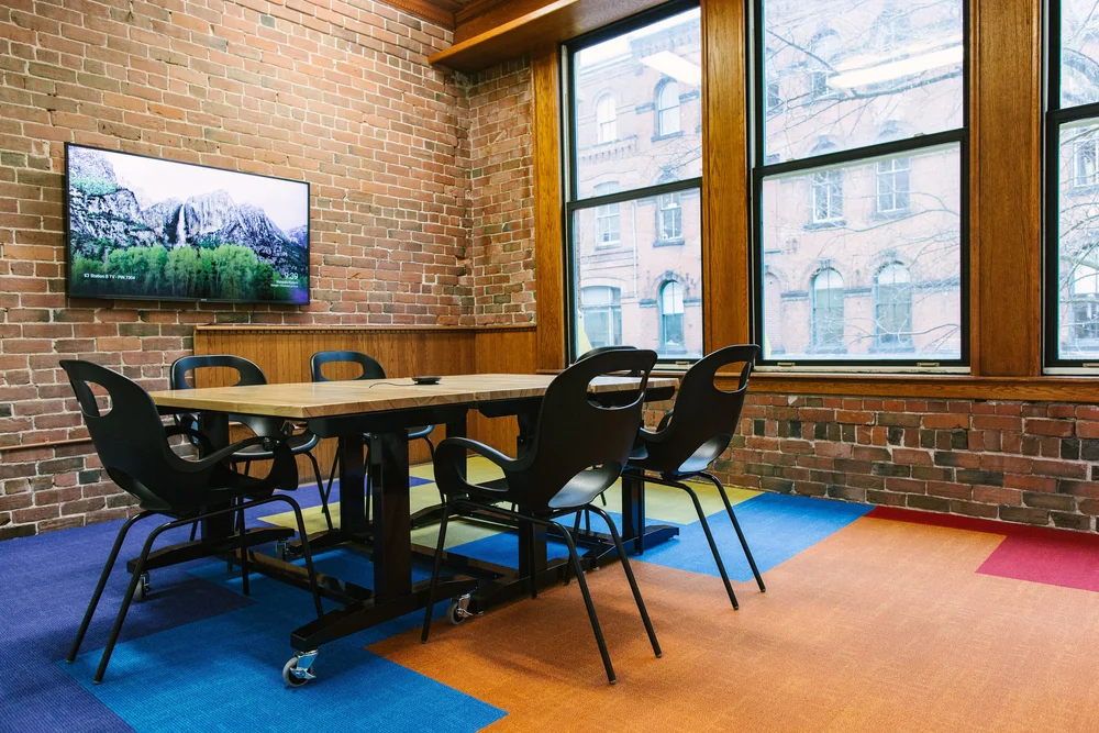 MoonShot room table and chairs by the windows