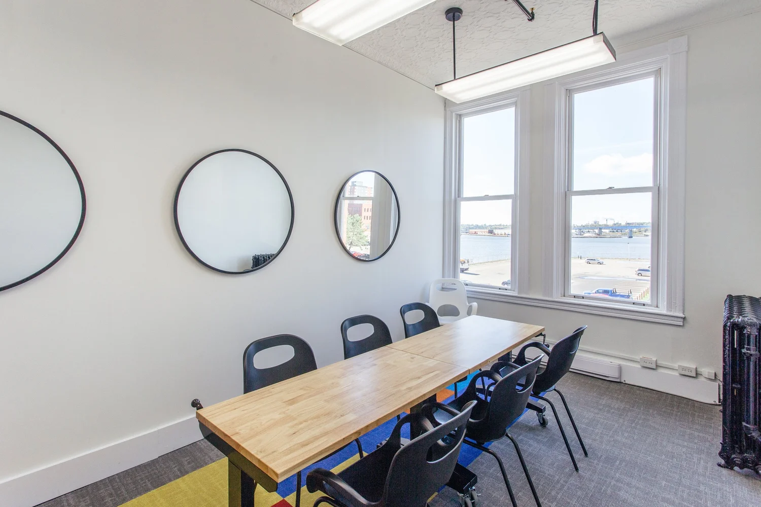 The HarbourFront meeting room at USTATION Harbourfront, Saint John