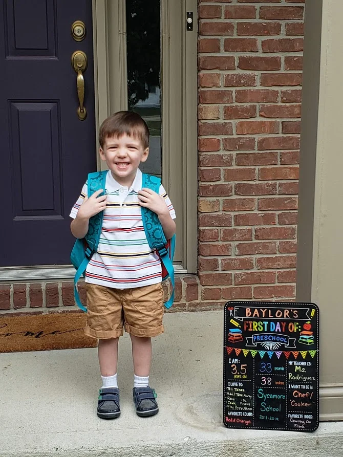 So excited to start school that he could hardly stand still for pictures.