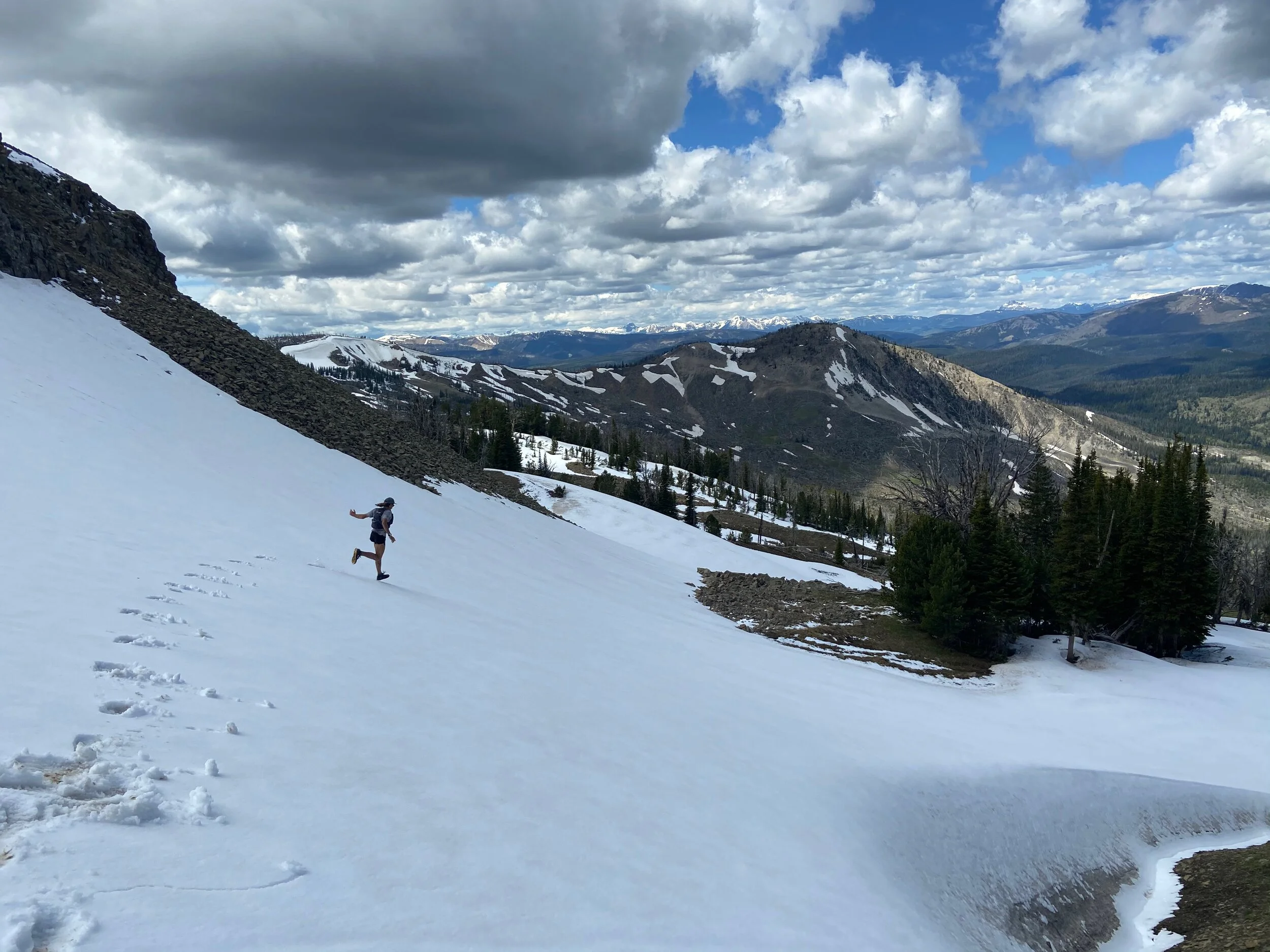 Descending a snowfield on Electric Pass