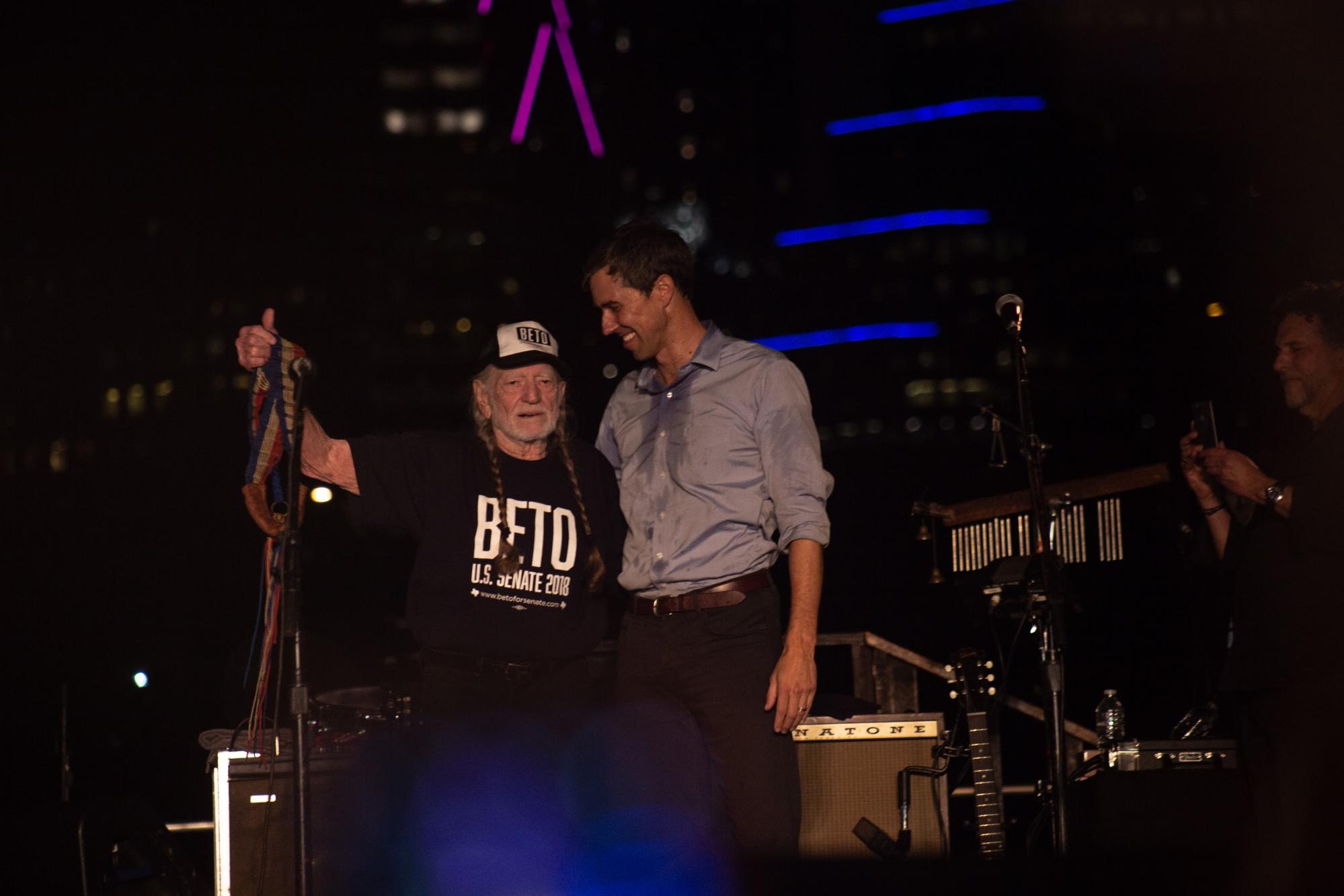   Senate candidate Beto O’Rourke welcomes Willie Nelson to the stage. Photo by Jonathan Castro.  