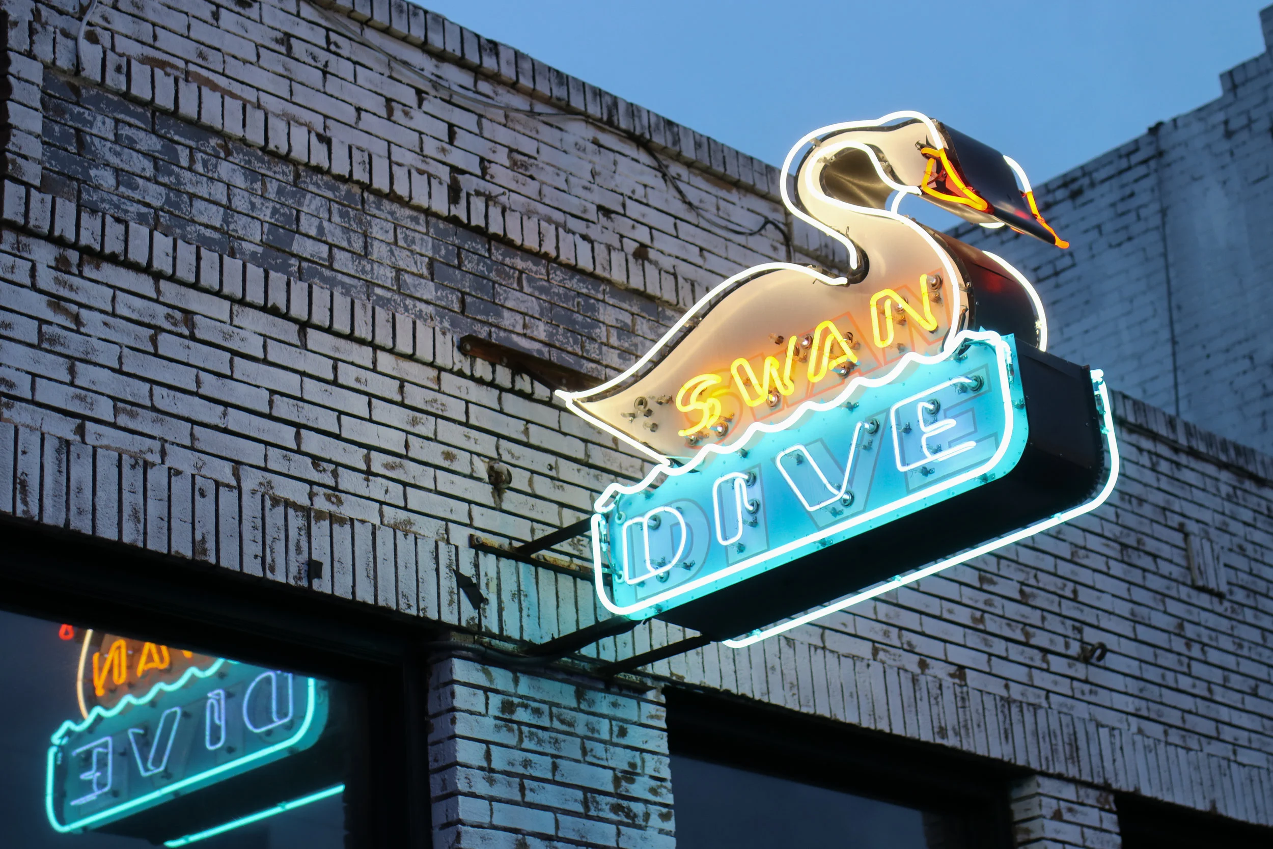 Swan Dive (615 Red River Street), a lounge that hosts live music, dance parties, burlesque, and more.