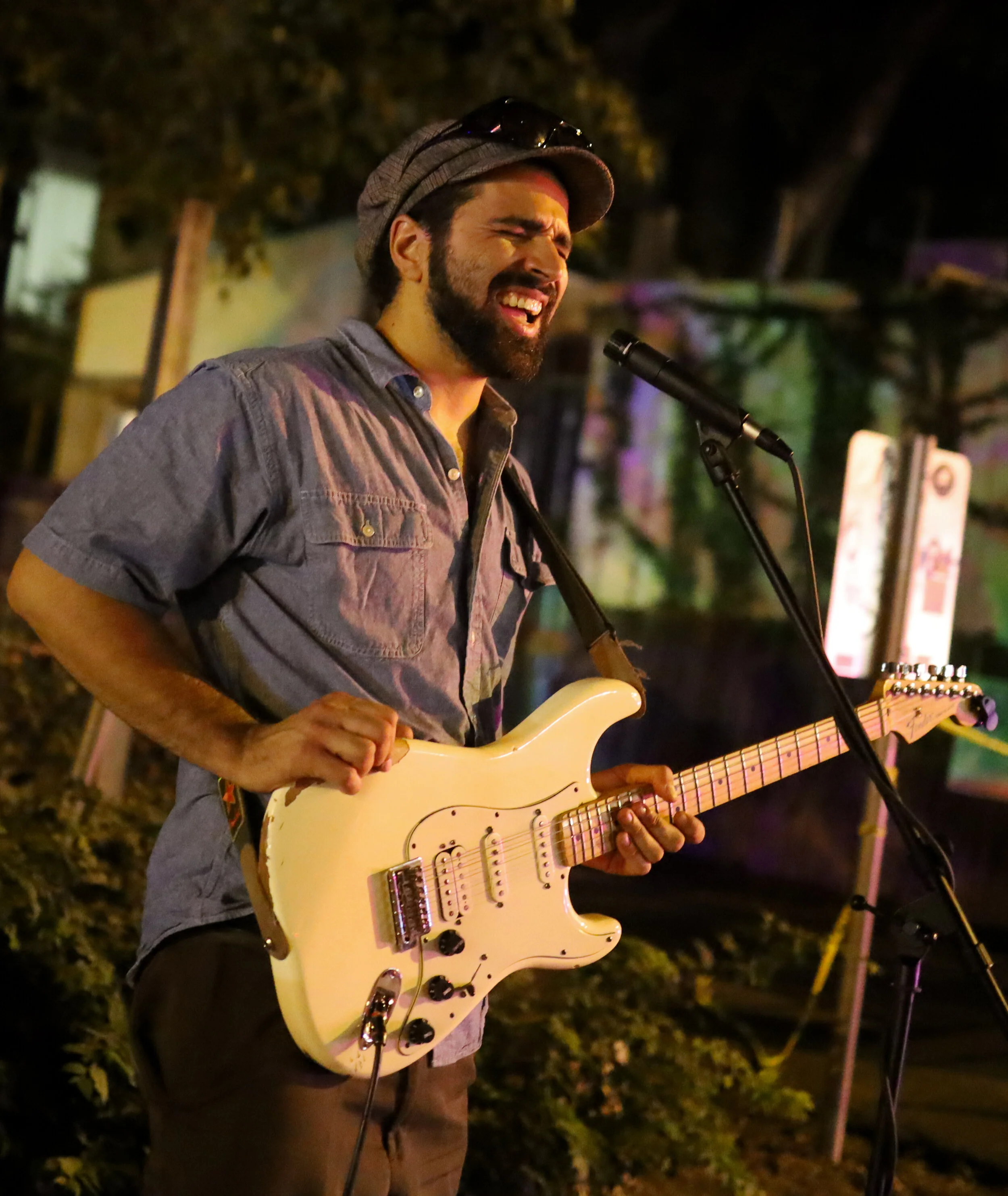 Michael Simon plays and sings for the crowd along Barton Springs Road