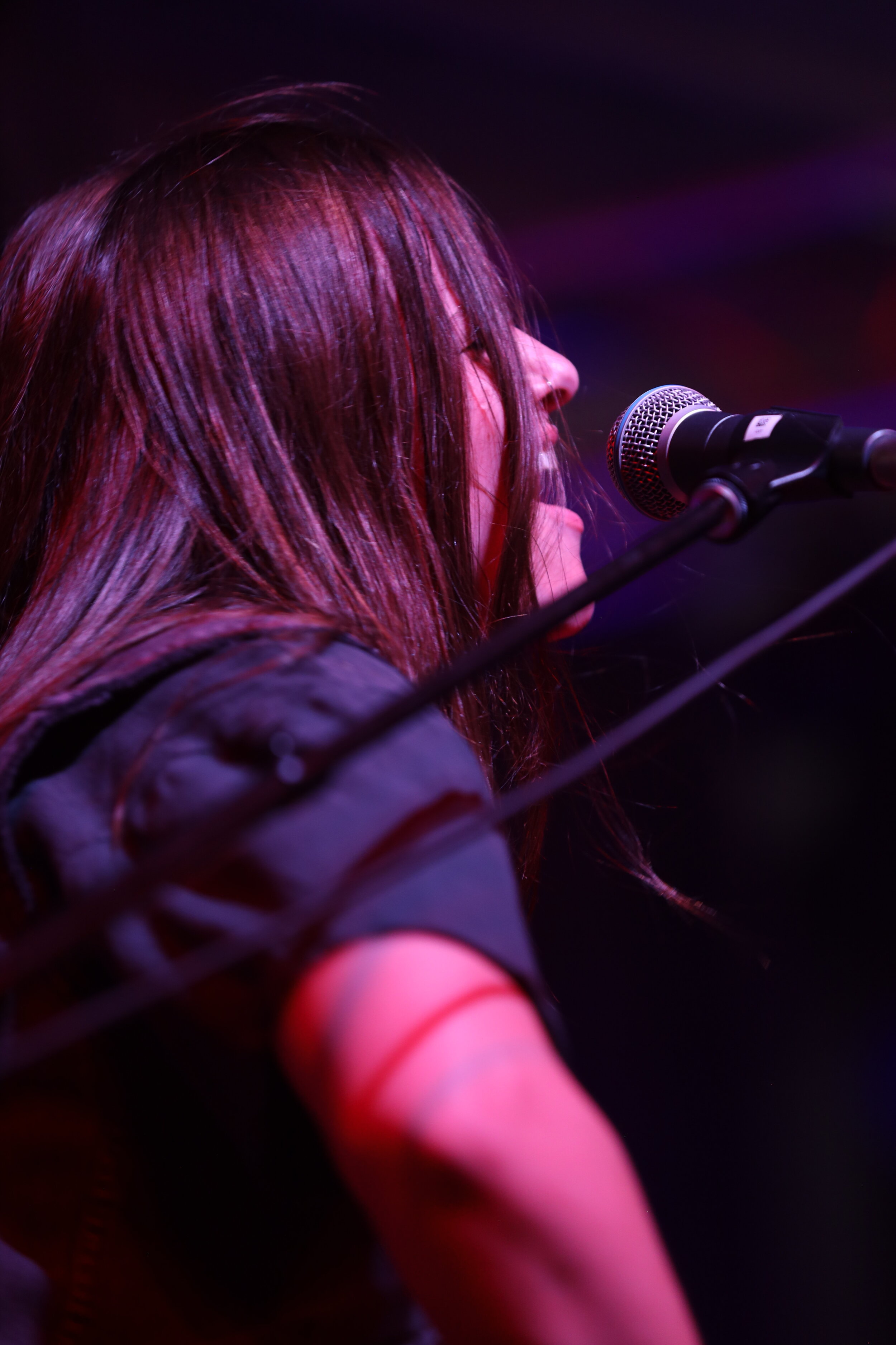  Emily Wolfe   intensely sings as she rocks out on guitar. 