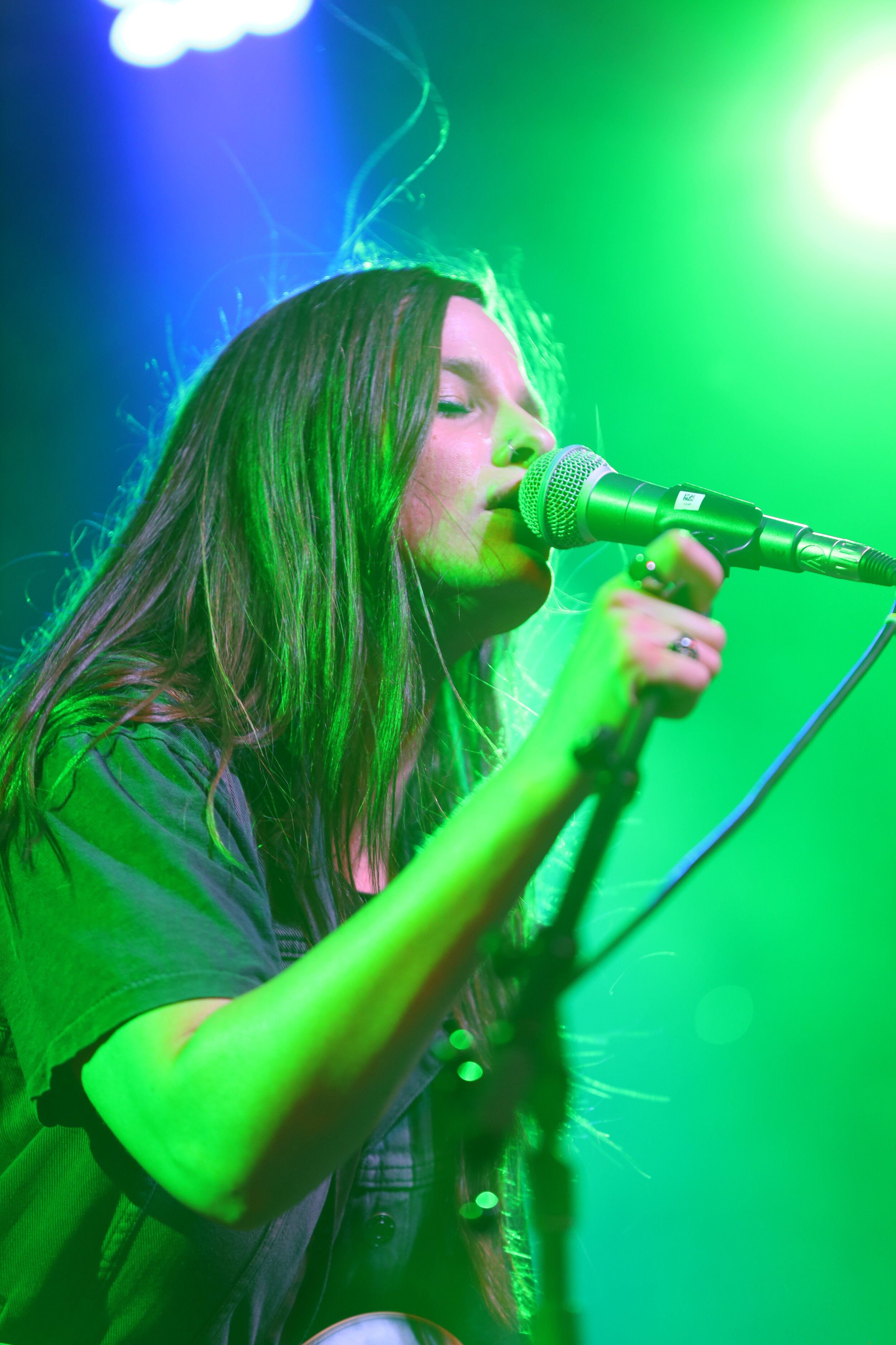  Emily Wolfe   intensely sings as she rocks out on guitar. 