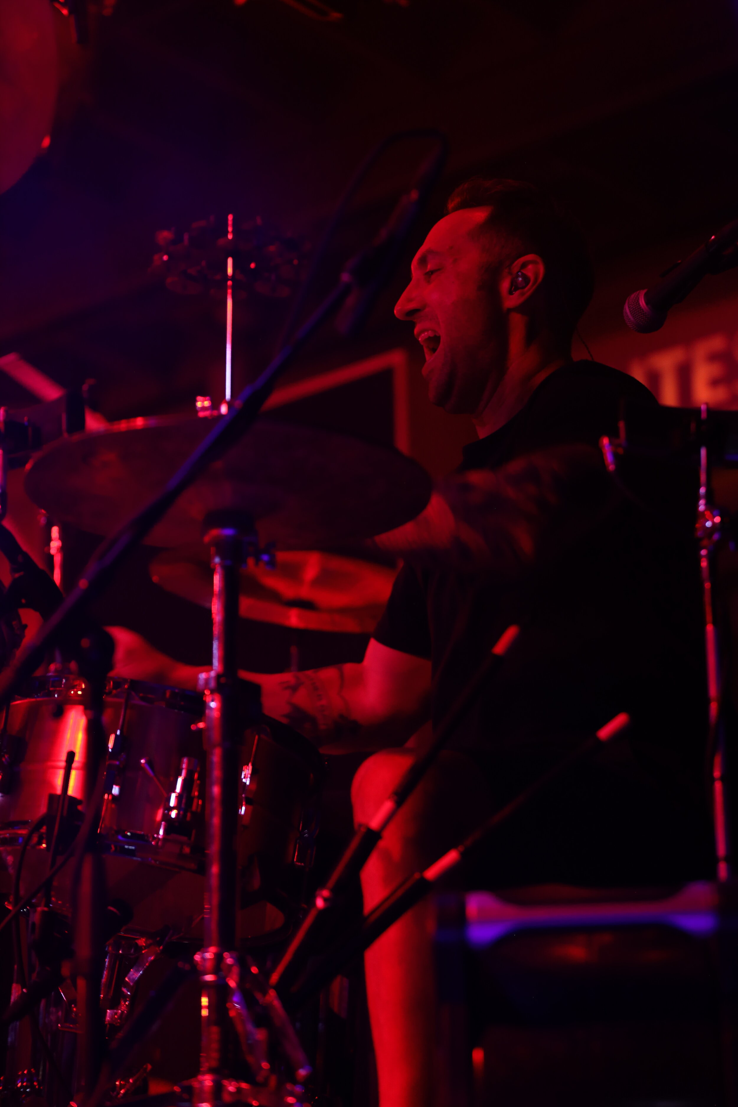  Drummer Clellan Hyatt smiles while playing. 