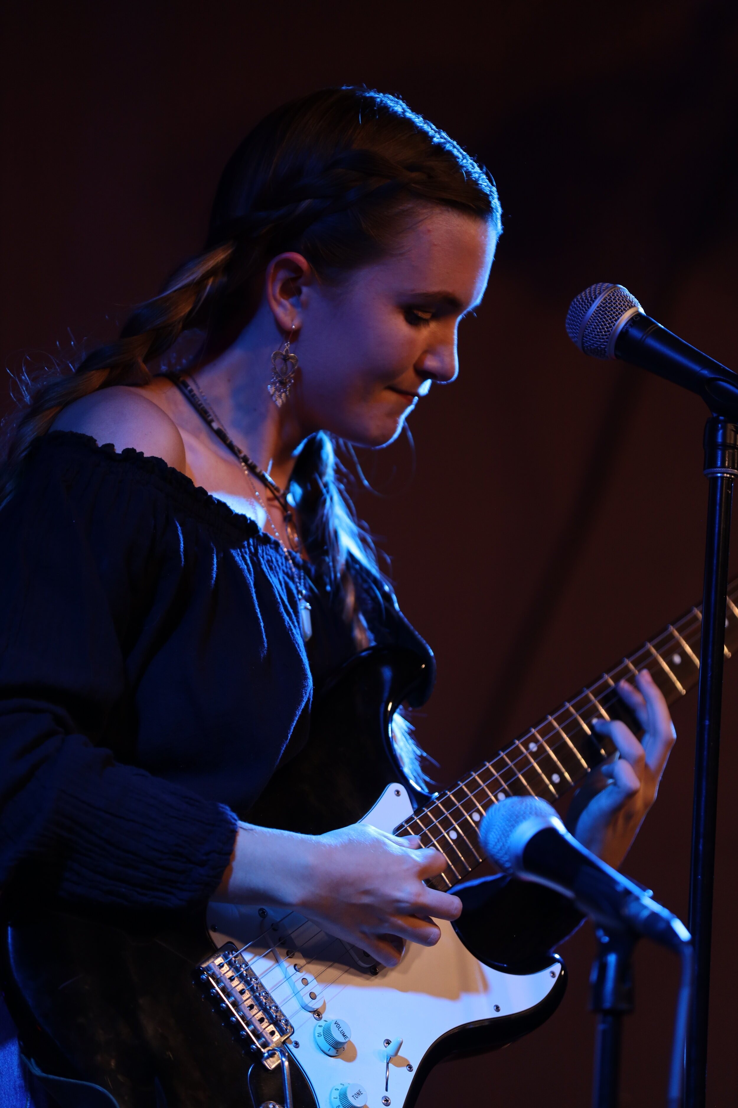  Hatchett captivates the audience with her moody vocals and fretboard precision.  