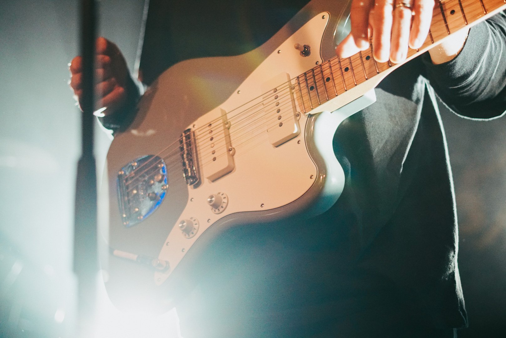  Caleb Chapman's guitar shines bright in the light of Antone’s. 