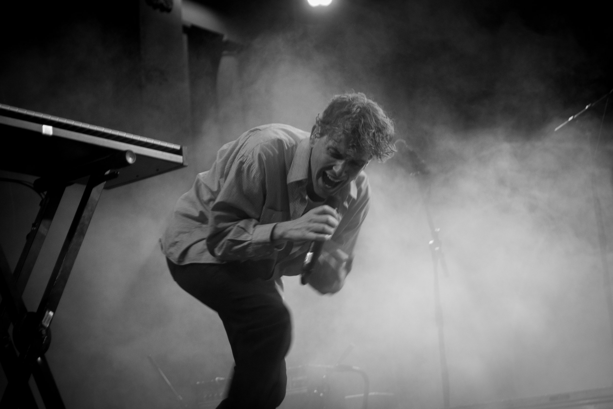  Chase Lawrence, COIN’s lead vocalist, belts while performing. 