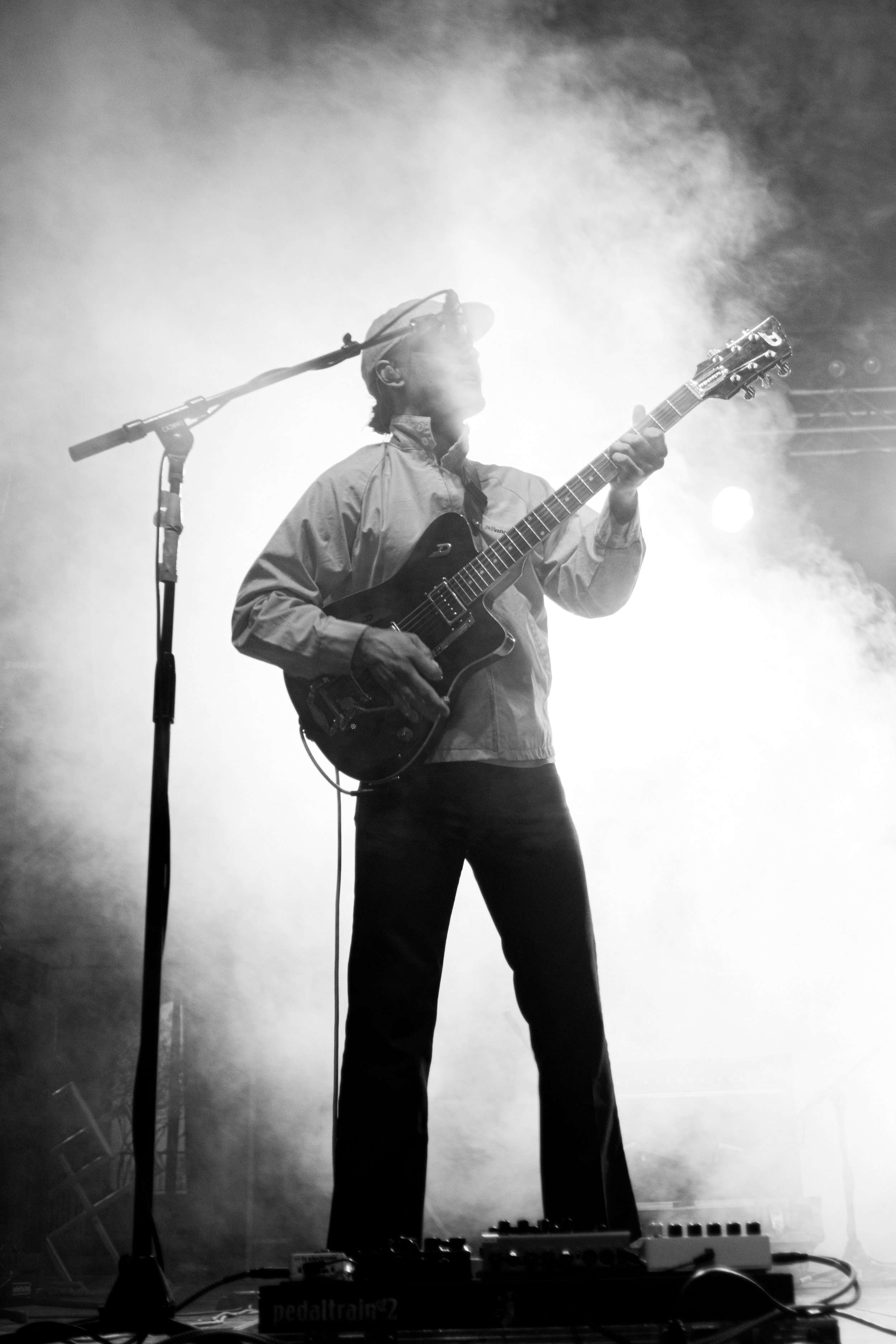  Joe Memmel, COIN’s lead guitarist, performs onstage. 