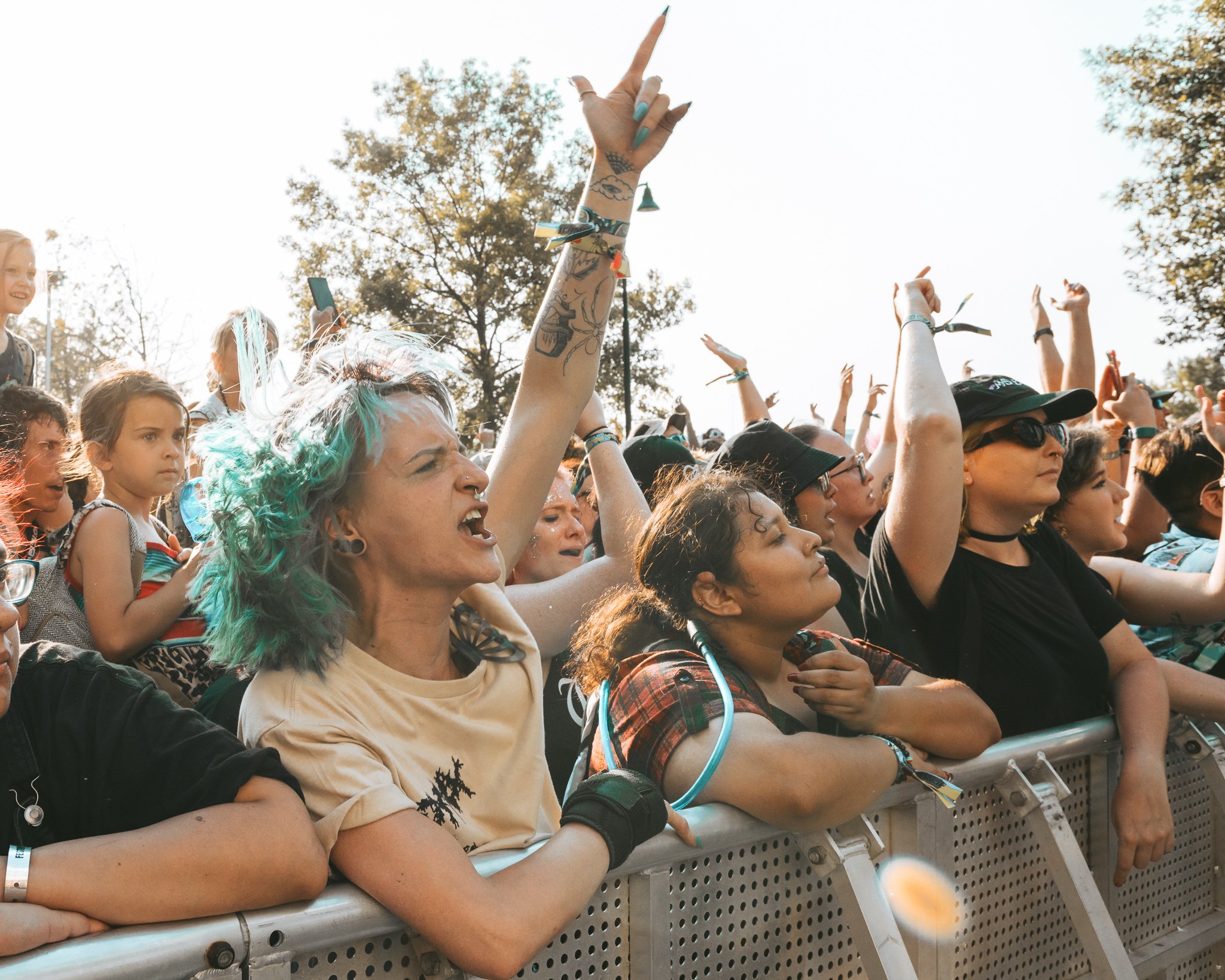  Fans rock out at the barricade for nothing, nowhere. 