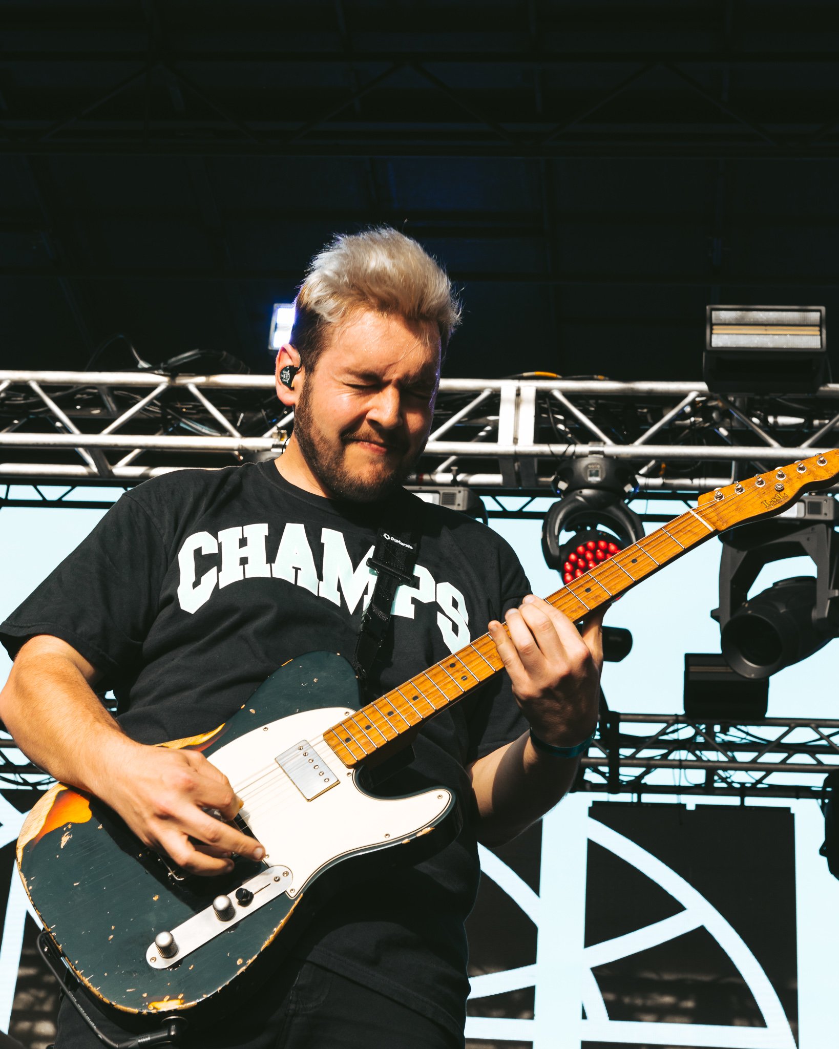  State Champs guitarist Tyler Szalkowski rocks out on stage. 