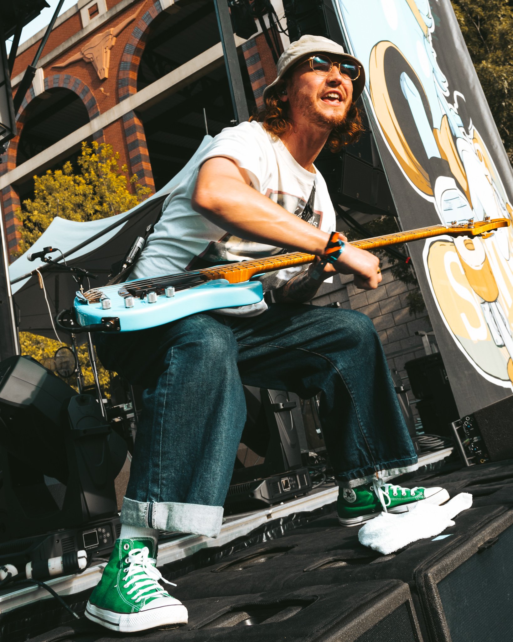  Bassist Ryan Scott Graham looks out at the crowd while playing. 