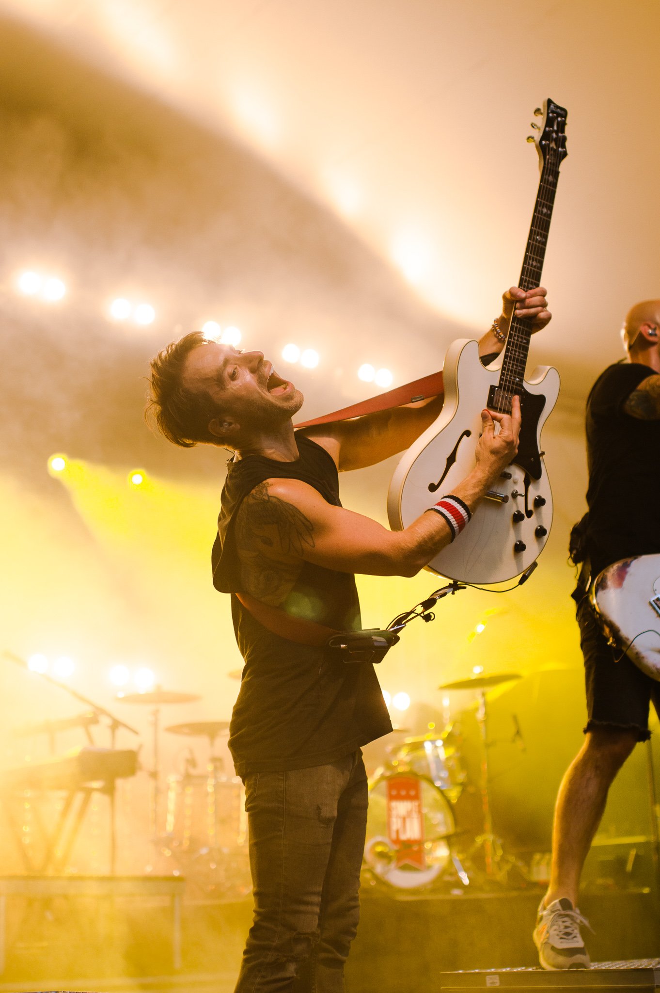  Sebastein Lefebvre hypes up the crowd as rhythm guitarist for Simple Plan. 