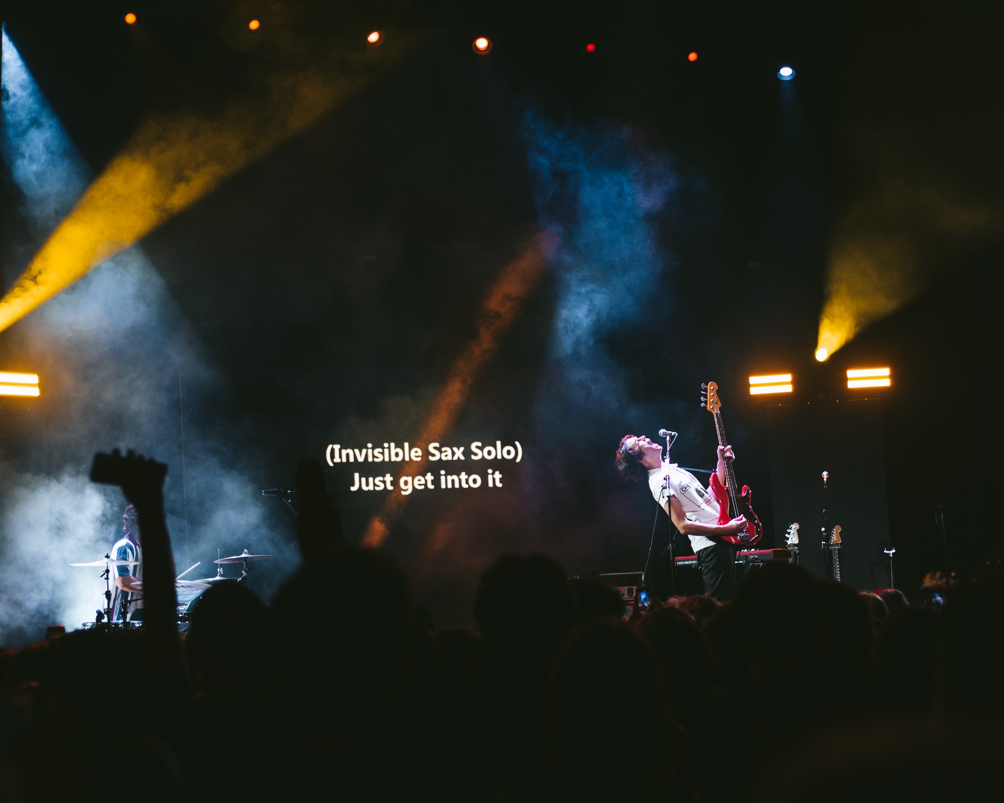  Dallon Weekes draws in the crowd with his captivating performance. 