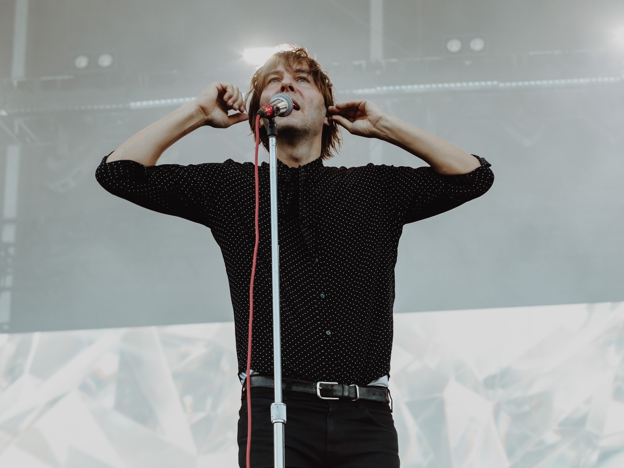  Phoenix frontman Thomas Mars opens up the set with the band’s hit song, “Lisztomania.” 