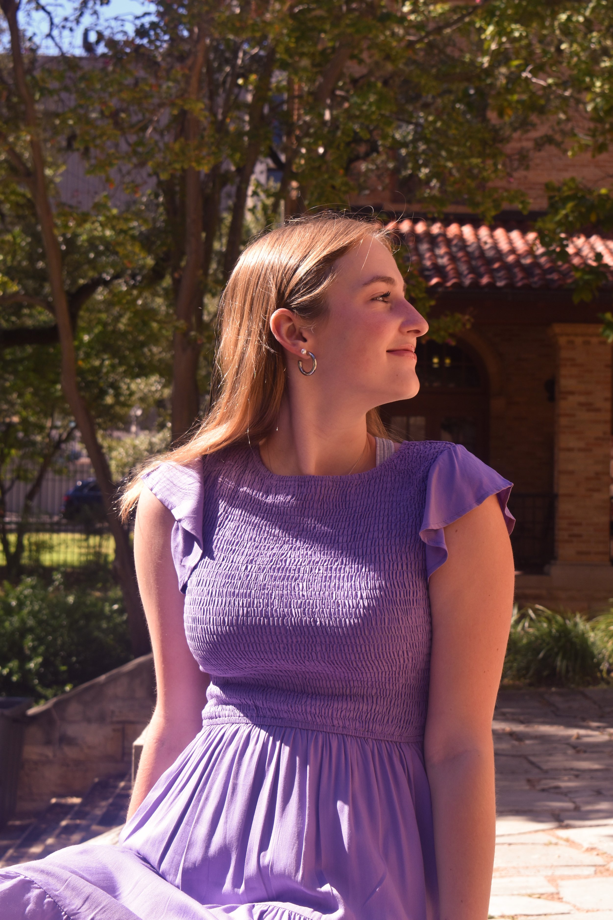   Speak Now : Abby McMorris grins in her new purple dress. 