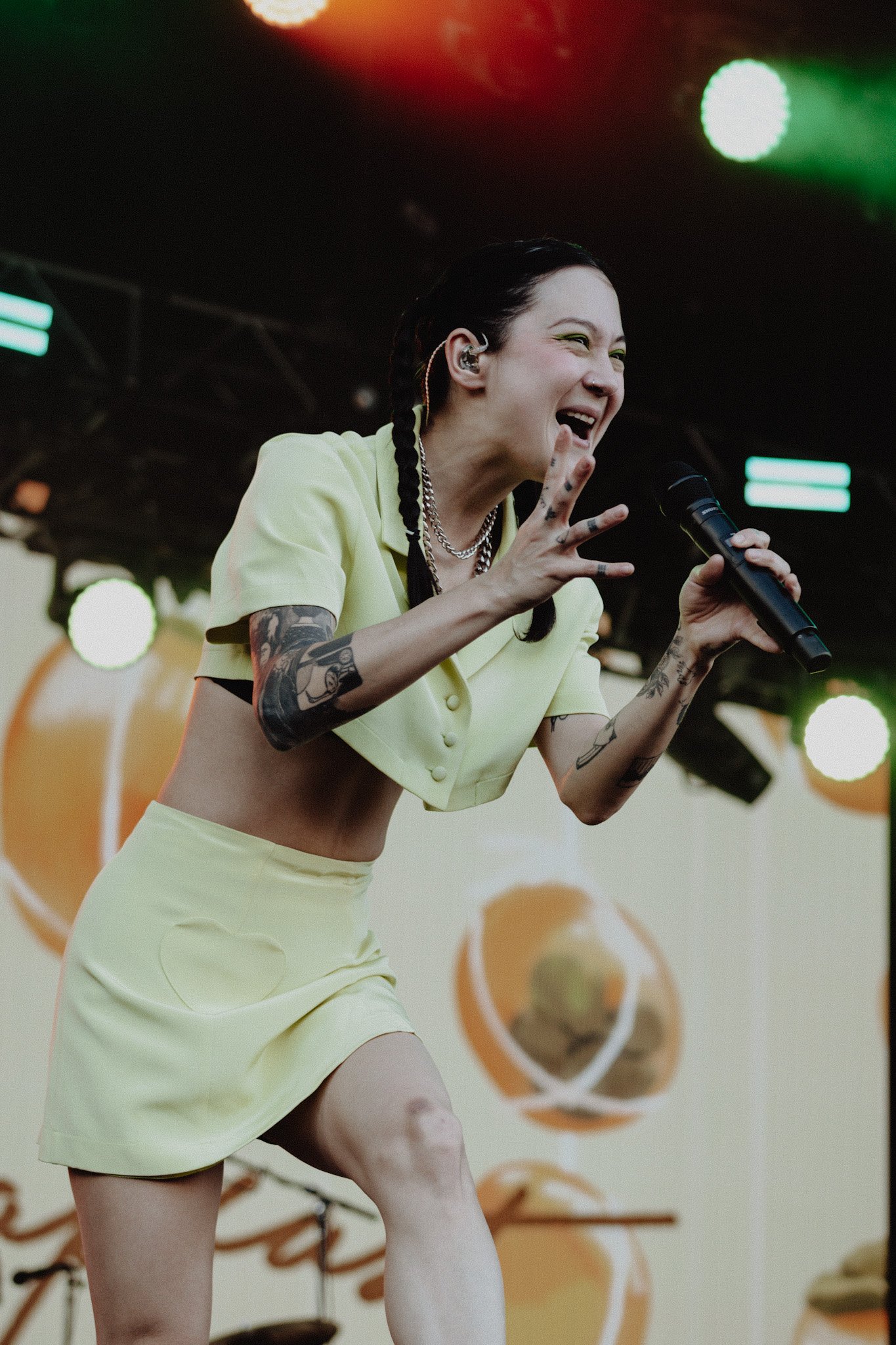  Frontwoman Michelle Zauner of Japanese Breakfast ignites the T-Mobile stage with her stunning performance. 